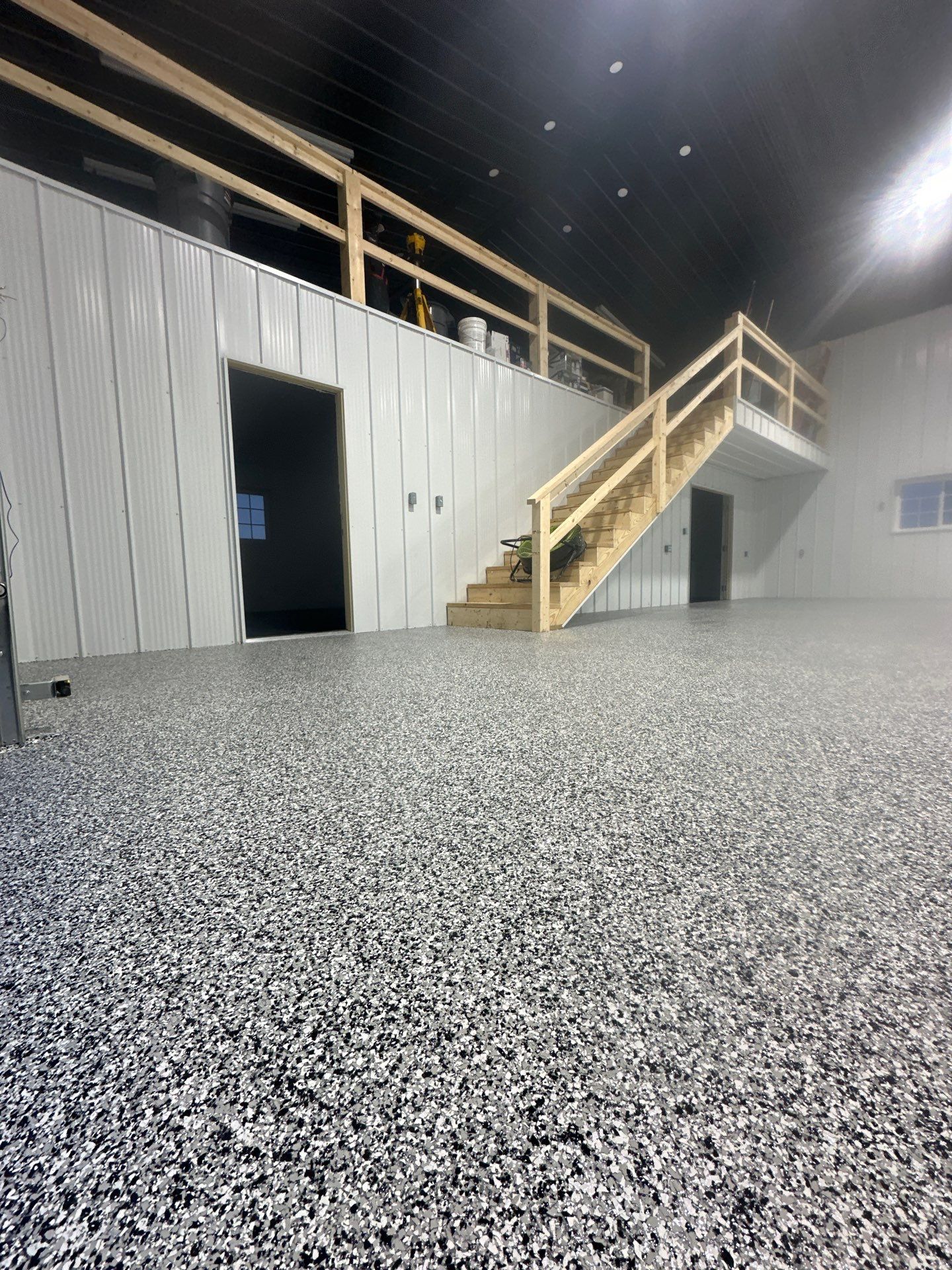 Barndominium Flake Coating using Polyaspartic by Revival Concrete Coatings