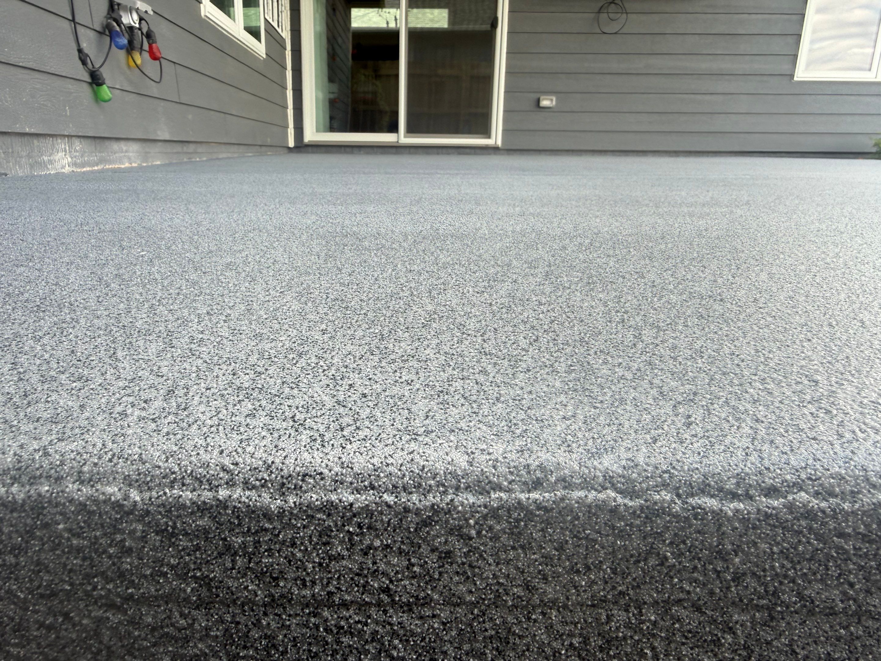 Decorative Flake Concrete Coating for Sioux Falls Porch and Patio by Select Painting, Coatings & Garage Cabinets
