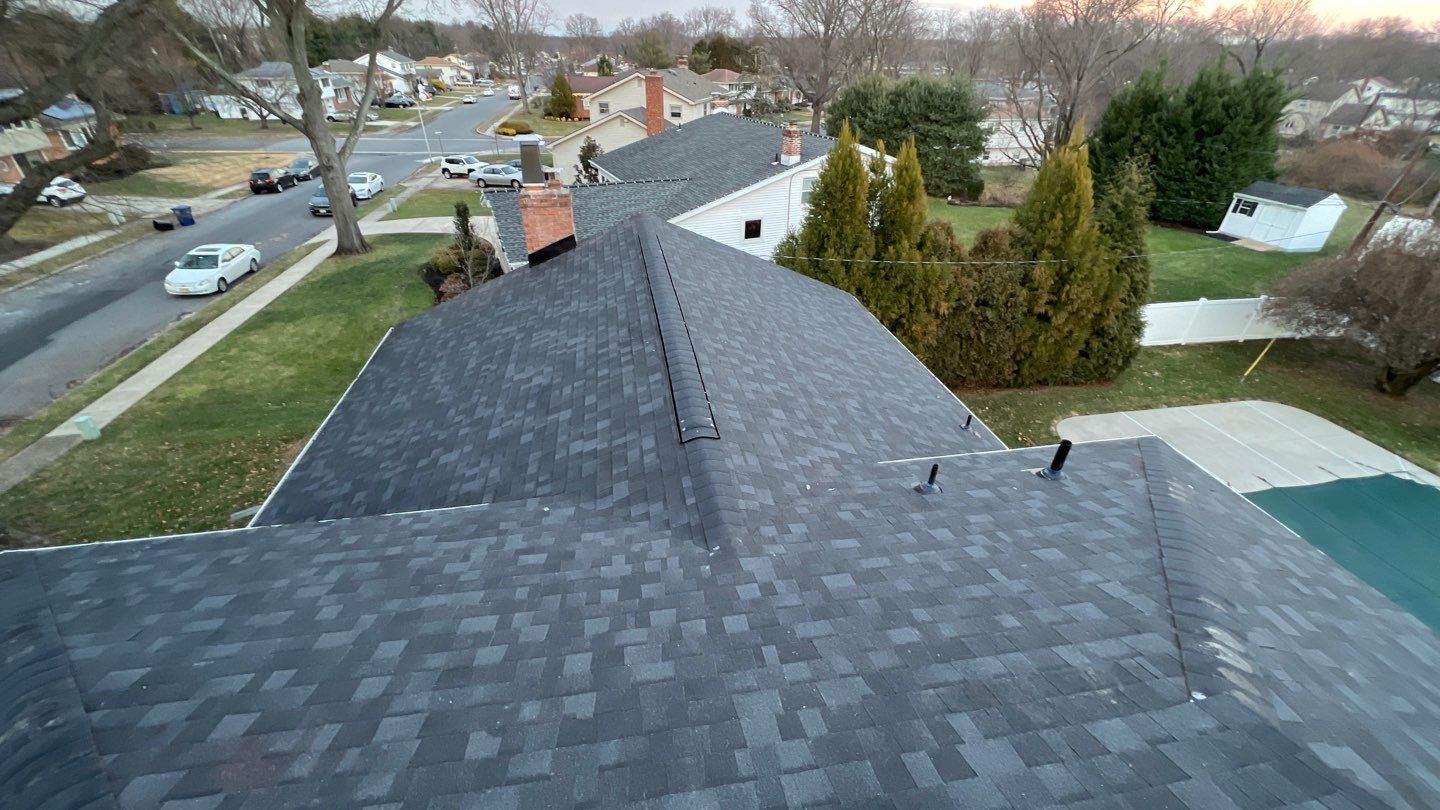 Onyx Black Shingles by Reimagine Roofing