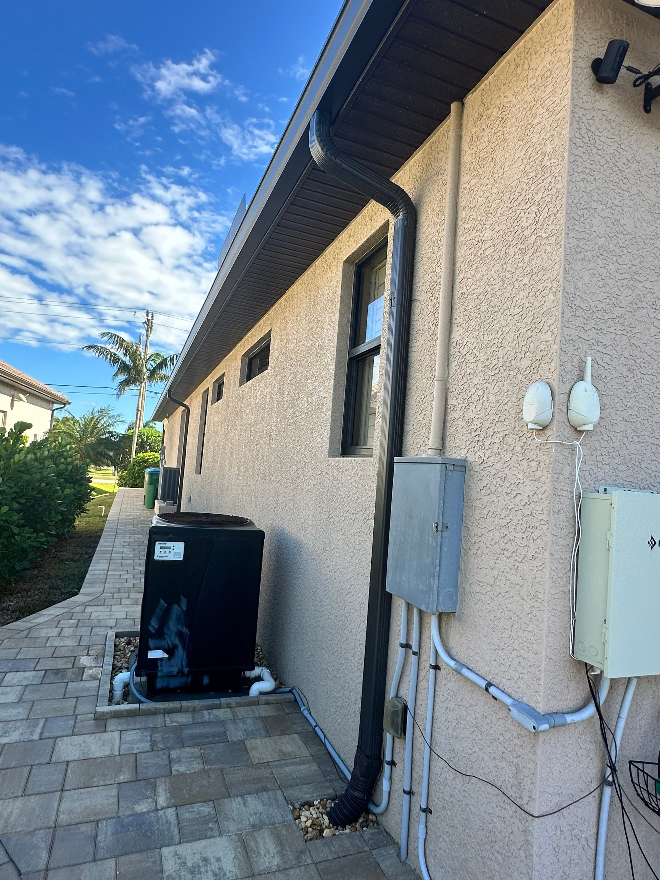 Bronze Downspout Installation in Cape Coral FL by Gutter Professors
