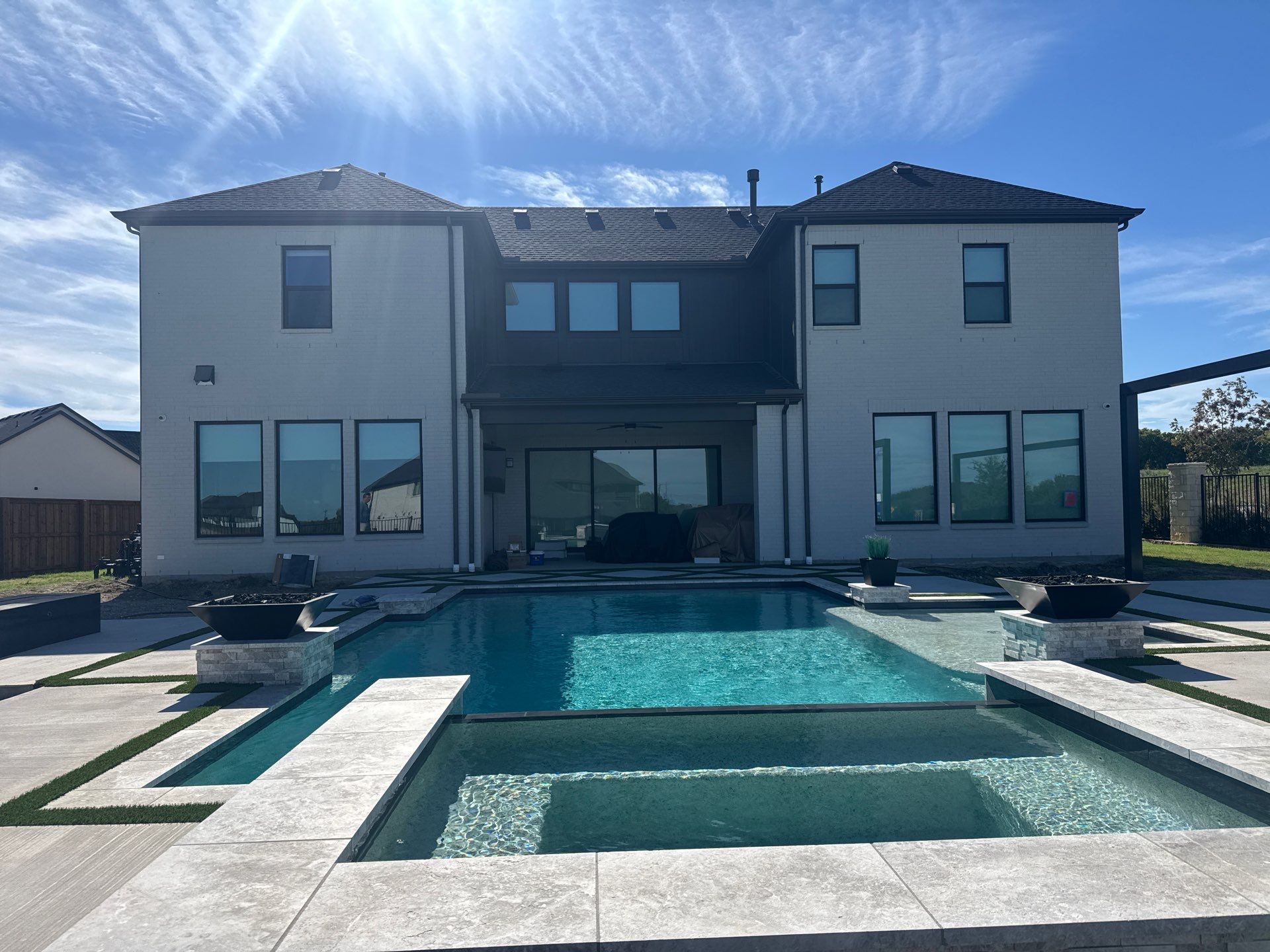 Modern Geometric Pool with Raised Spa, Tanning Ledge and Fire Bowls by Pinnacle Pools and Spas - DFW