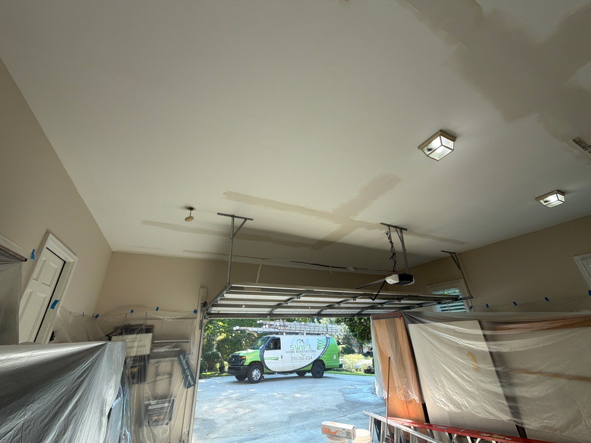 Multi-Story Stucco Home Exterior Painting and Garage Refresh in Marietta by Swift Home Renovations 