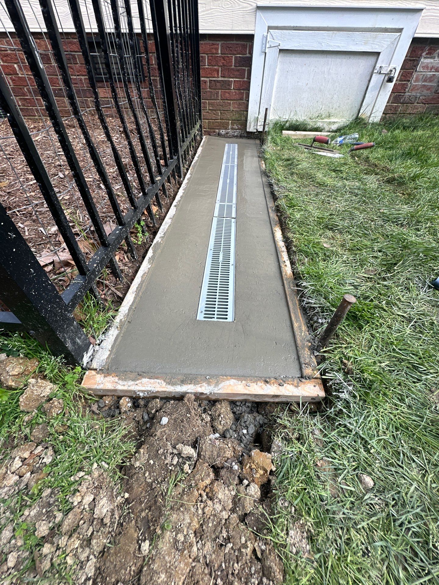 Channel drain installation Durham by Martinez Brother’s Nc Landscaping Inc
