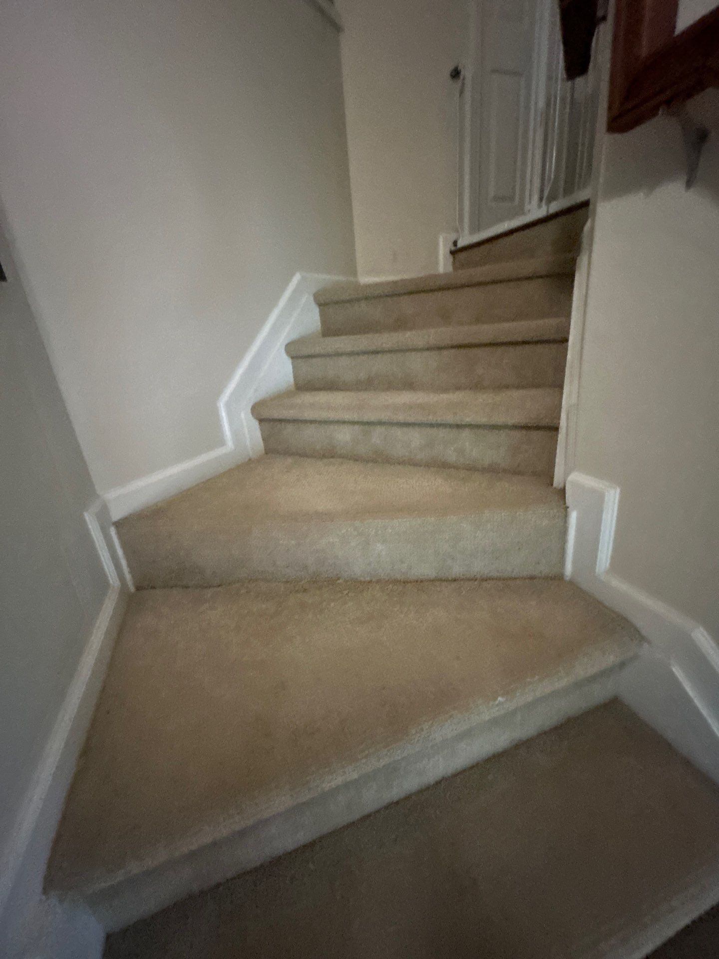 UPGRADE to solid oak stair treads by Footprints Floors of East Atlanta