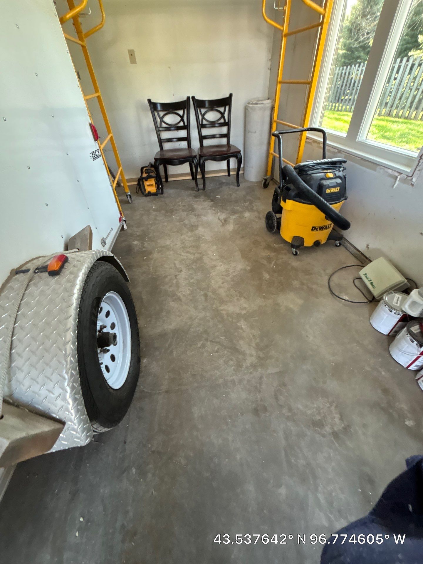 Coyote Flake Concrete Coating for Sioux Falls Garage by Select Painting, Coatings & Garage Cabinets