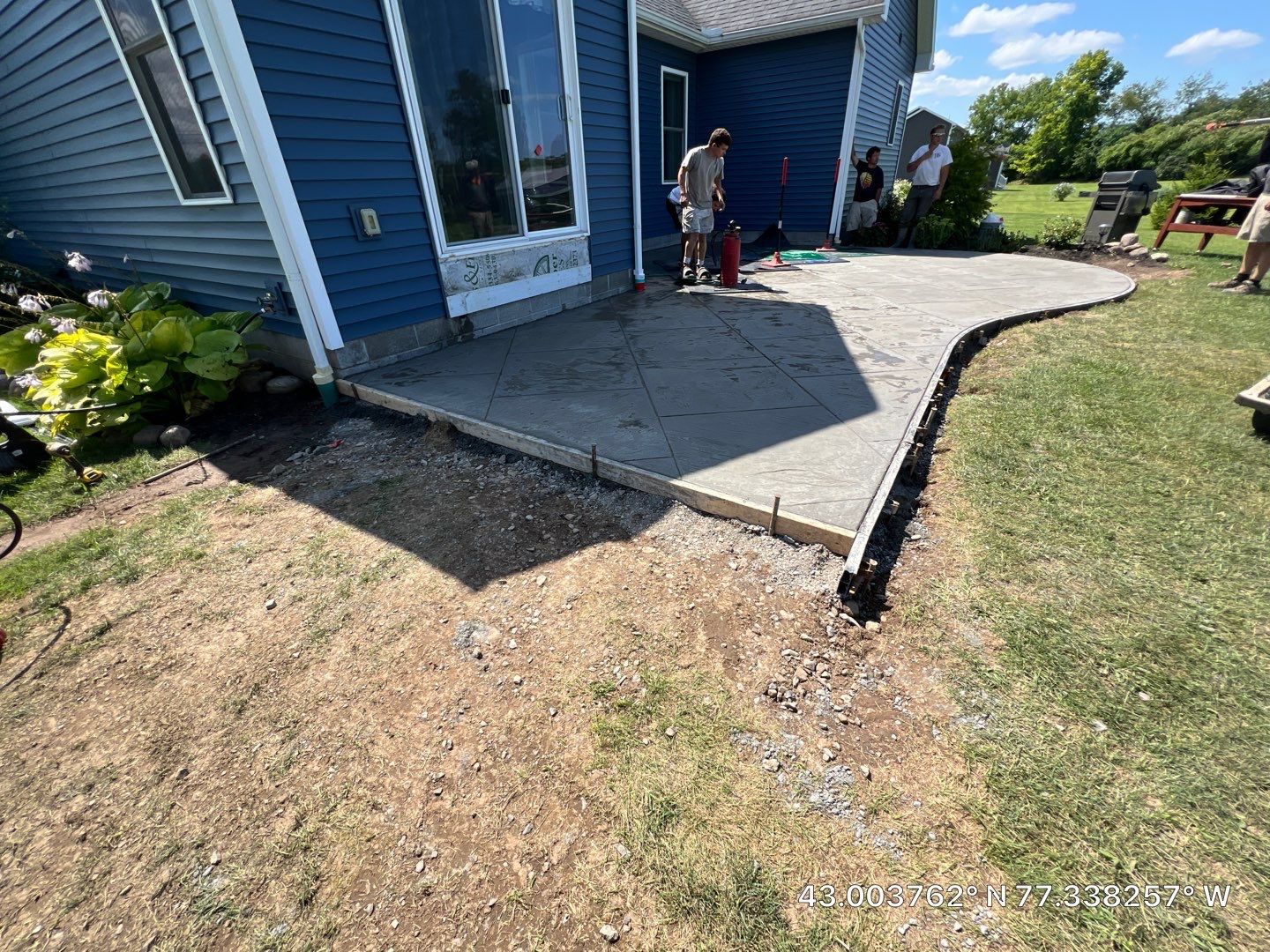 Slate stamped concrete patio  by NG Masonry & Construction LLC