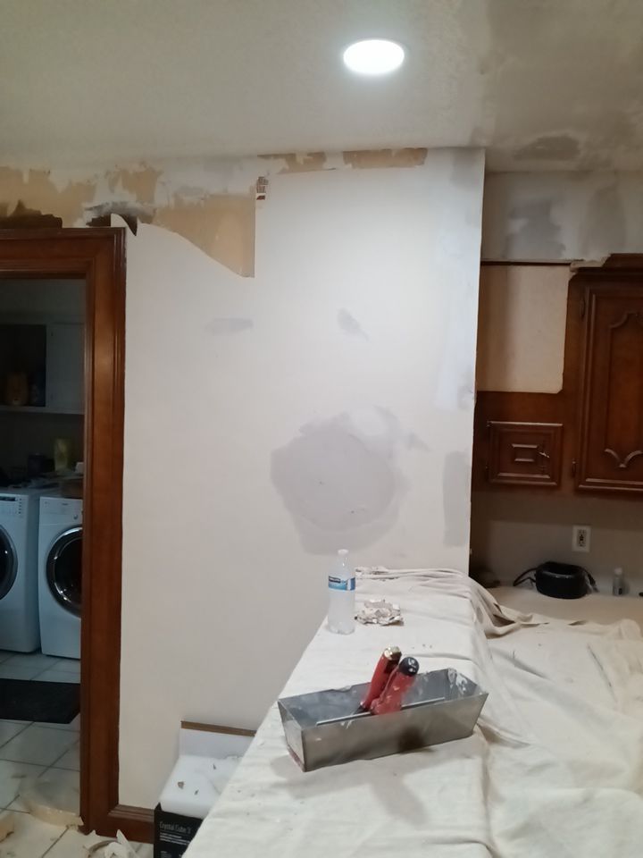 Interior and exterior painting project by Roof Concepts Construction