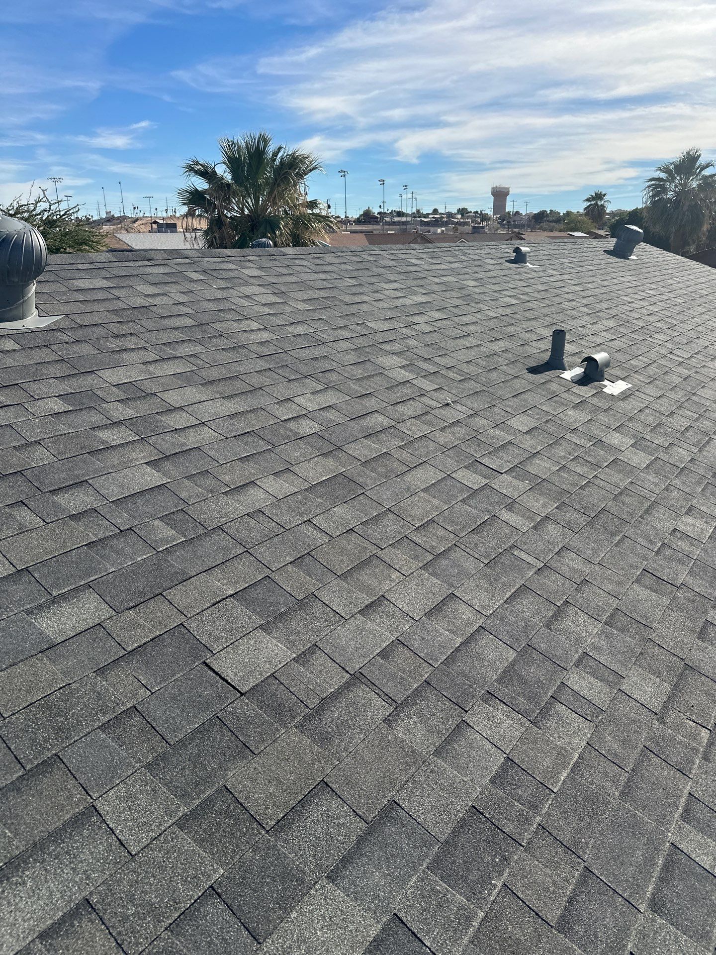 Estate Gray Shingles by Reimagine Roofing