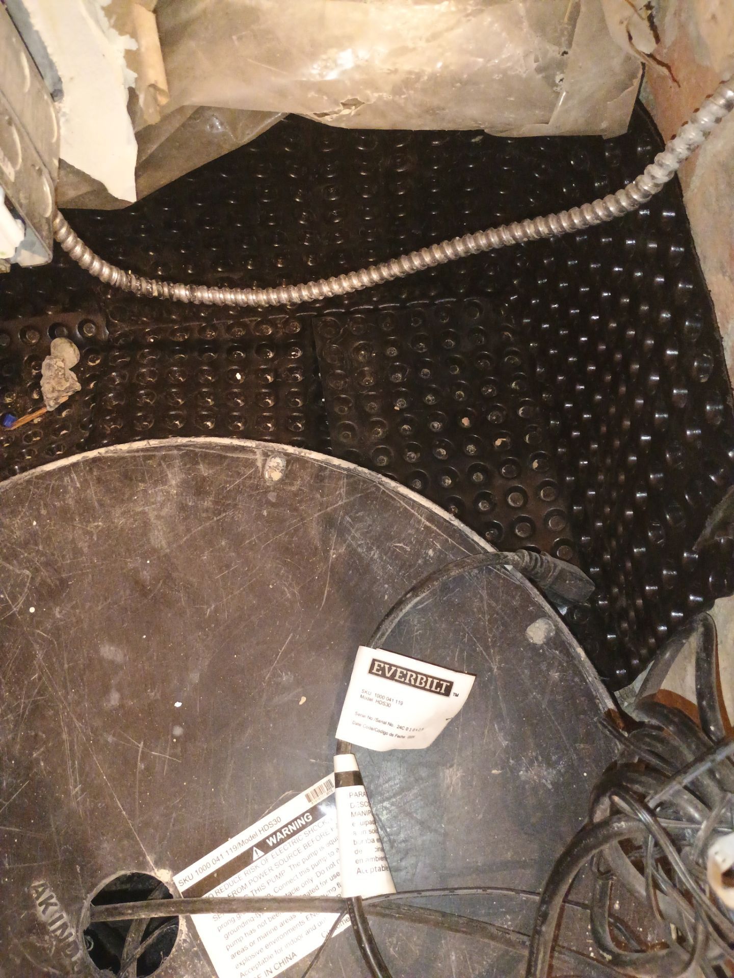 Interior Drain Tile & Sump Pump in Northwest Minneapolis by Waterproofing Northeast