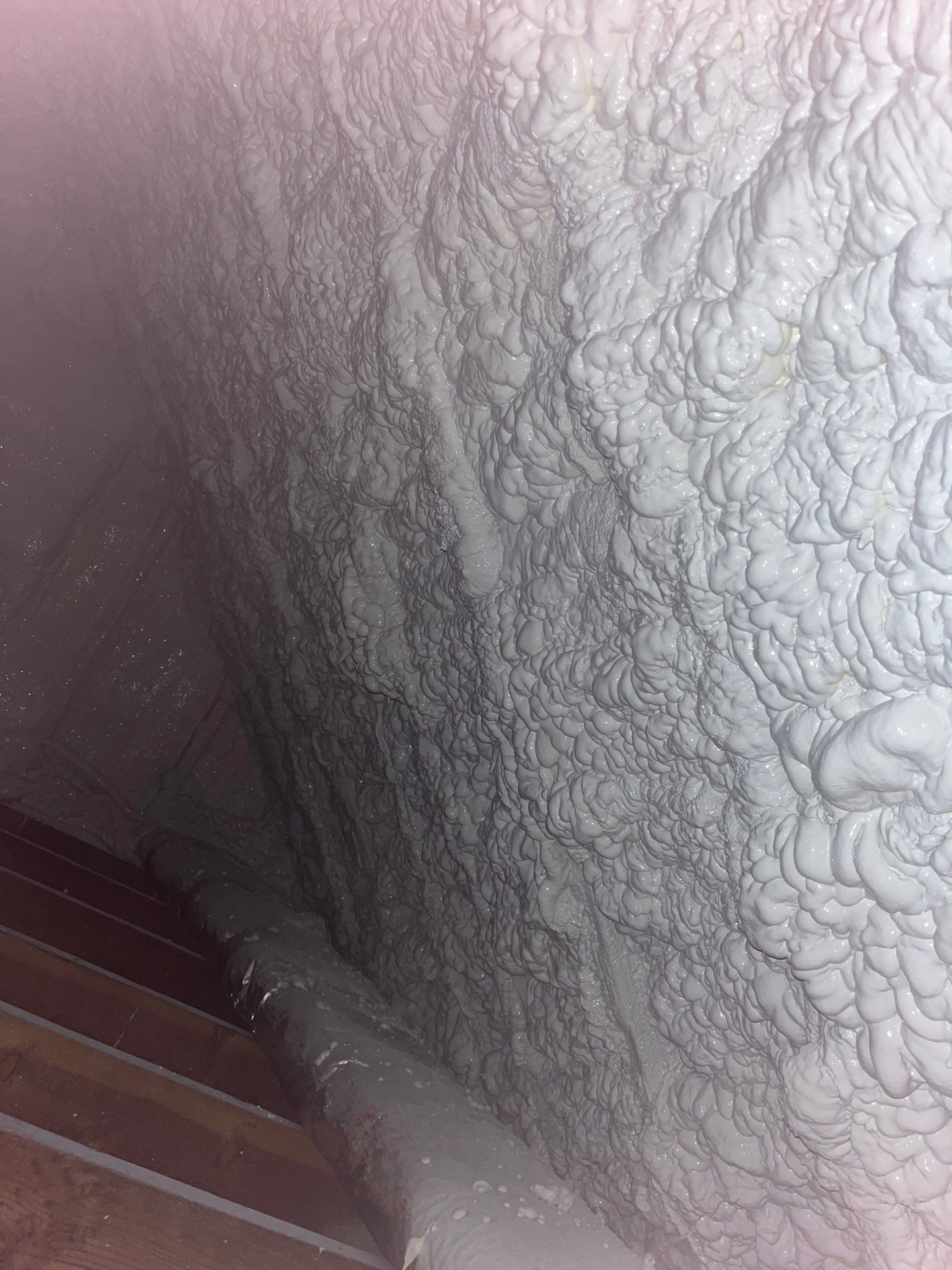 Attic Retrofit using open cell spray foam by NYS Foam & Energy