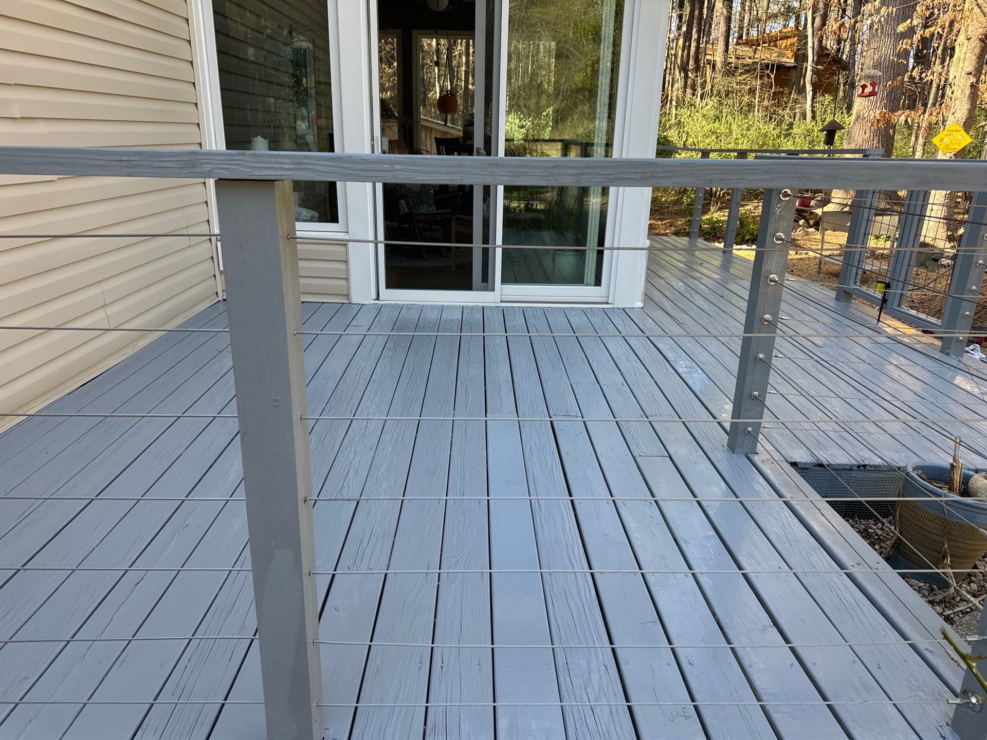 Deck staining by GonzalezPainters & Contractors Inc 