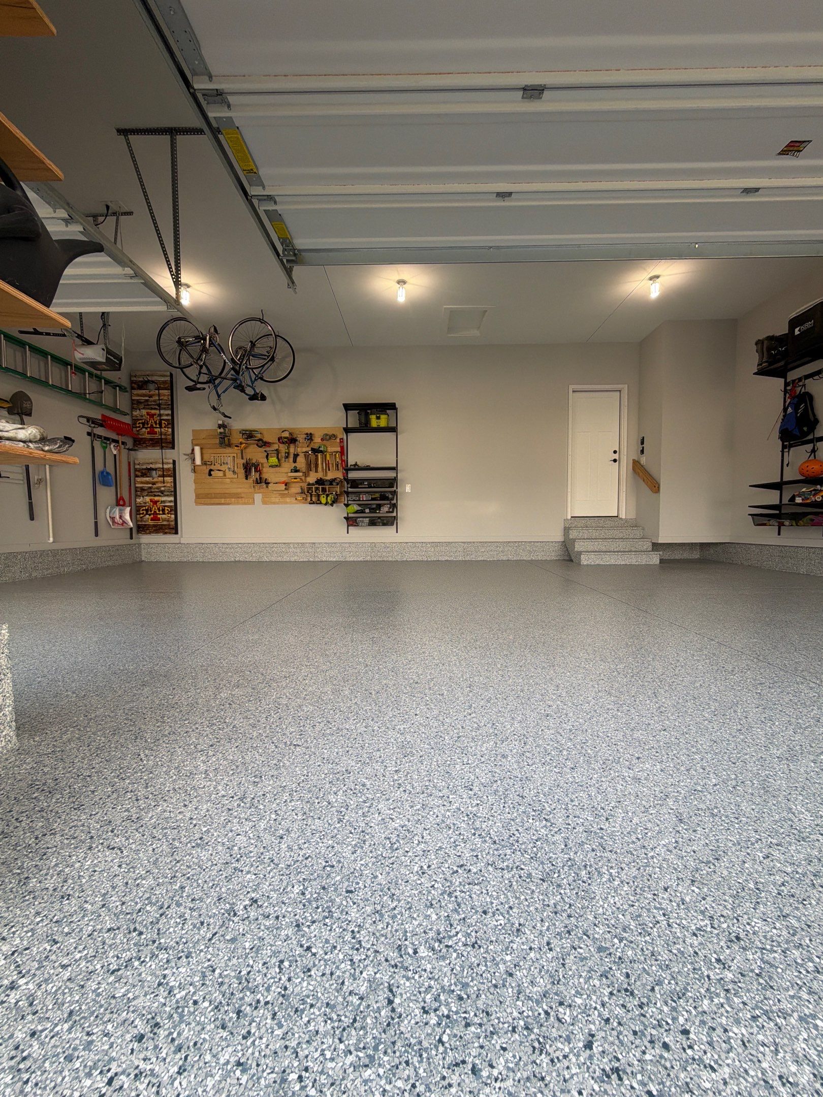 Waukee 3-Car Garage Transformation by Revival Concrete Coatings
