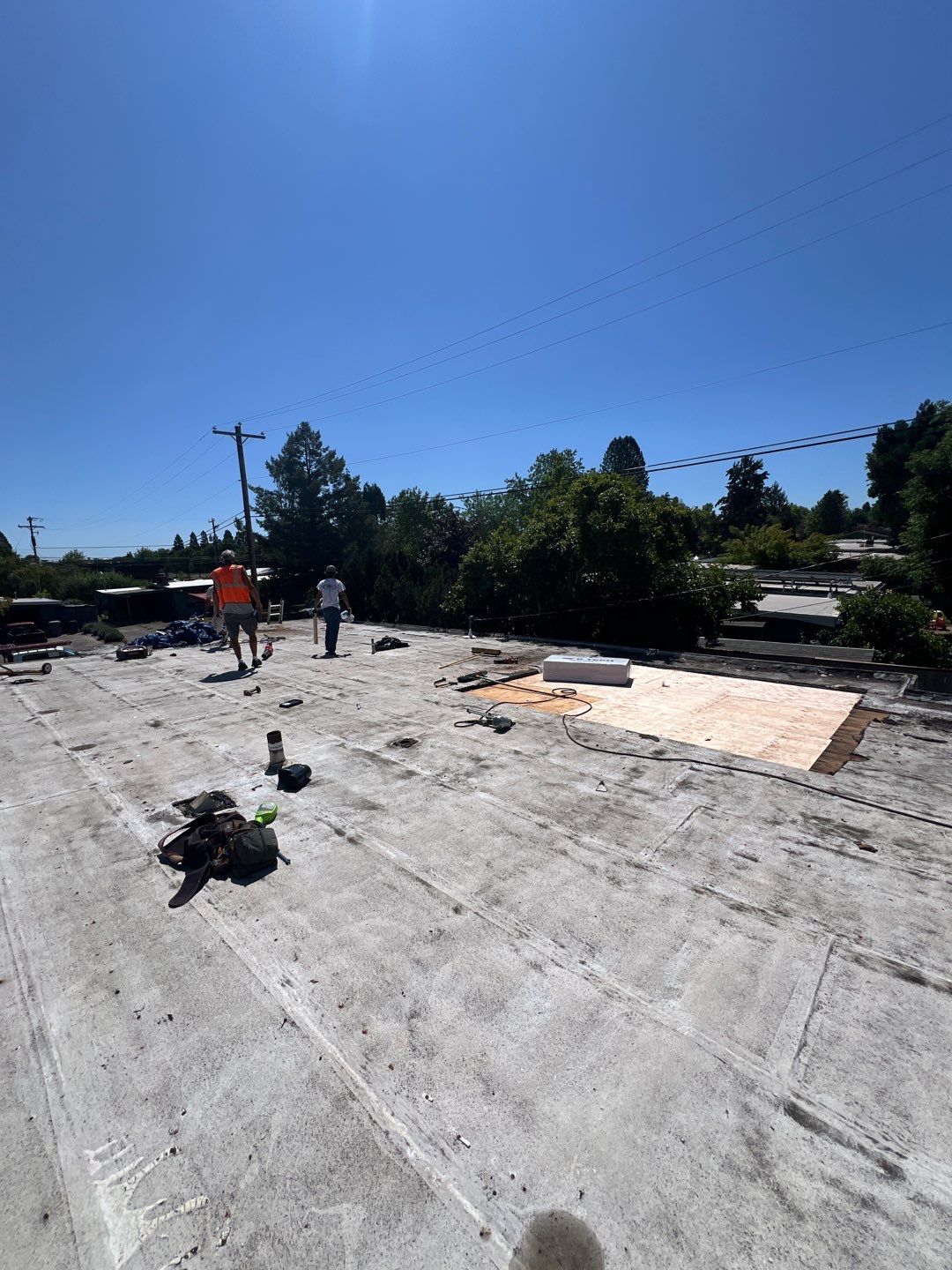 Residential Flat Roof Installation using GAF 60Mil TPO  by Orezona Building & Roofing Company, Inc.