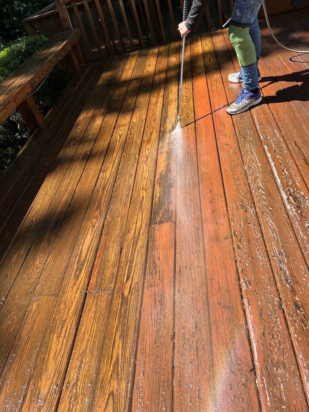 Triple deck re-staining by AKK Painting LLC