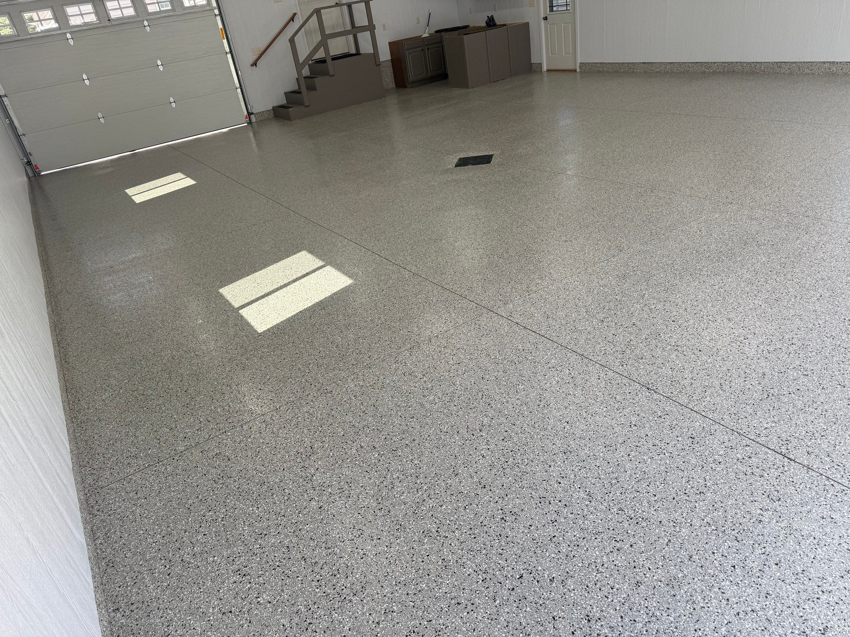 Speckled Epoxy Concrete Coating for Edgerton Garage Floor by Select Painting, Coatings & Garage Cabinets