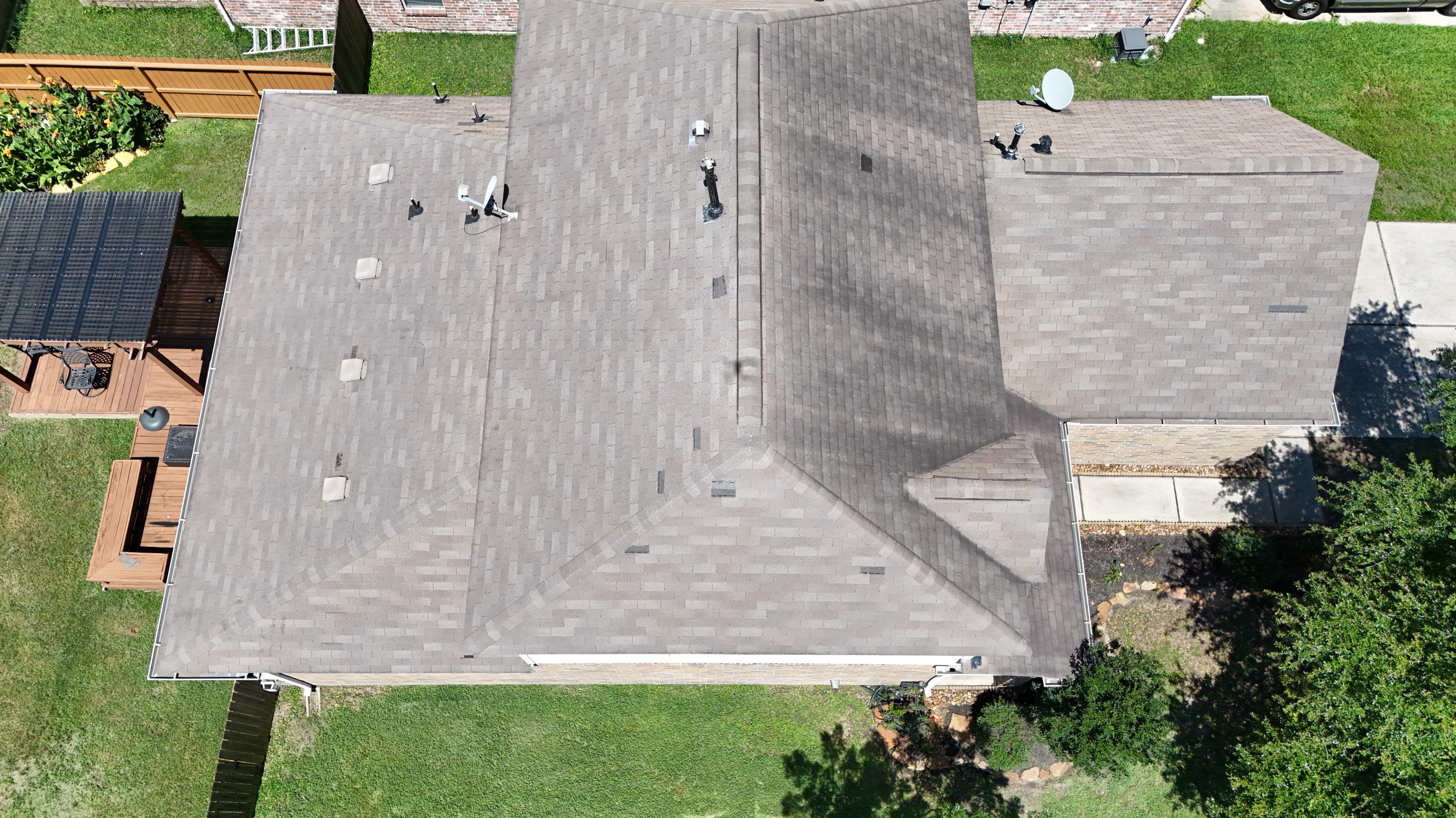 Full Roof Replacement in Warm Brown Tones — Spring, TX by PL Roofing & SB Roofing, LLC.