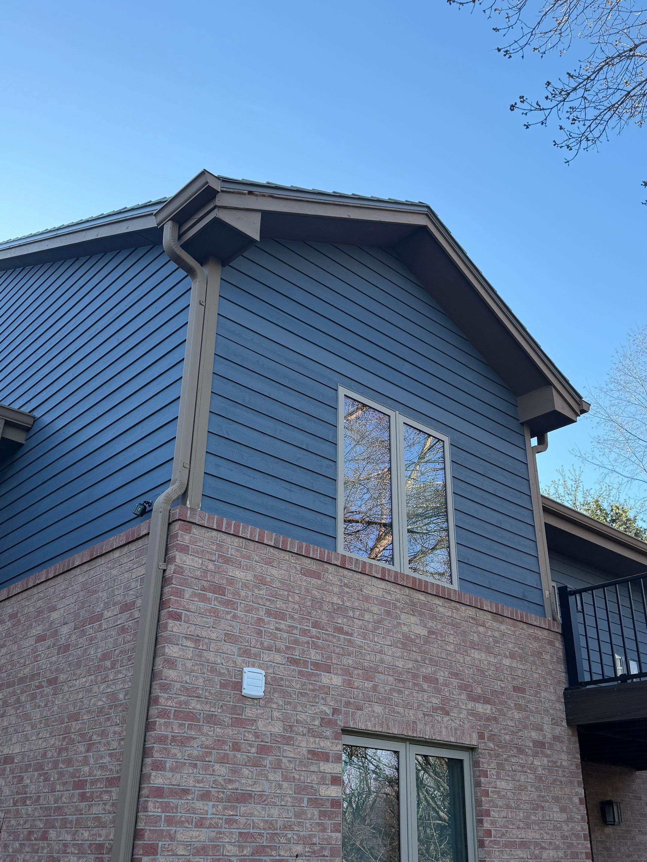 Residential Exterior Painting and Siding Refresh in Sioux Falls by Select Painting, Coatings & Garage Cabinets