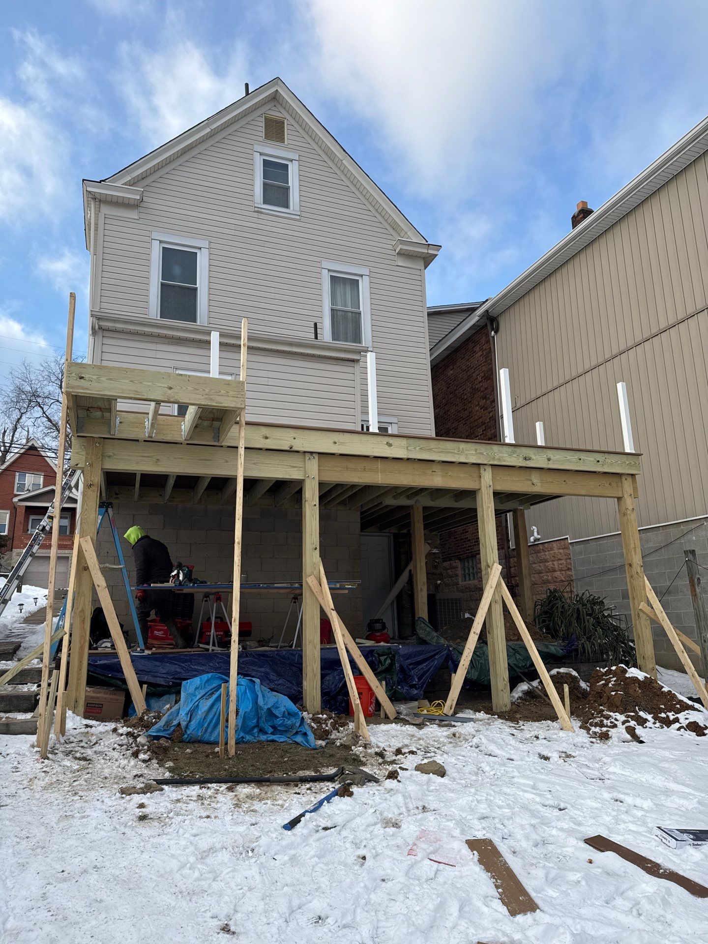 Deck and door by Cousins Roofing Siding & Decks