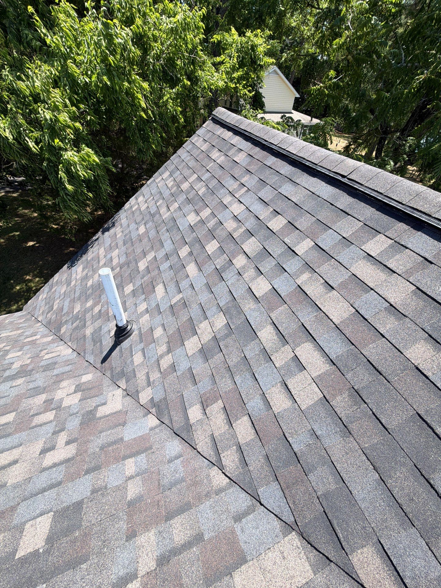 Complete Asphalt Shingle Roof Replacement and Sheathing Repair in Deltaville by Cade Construction