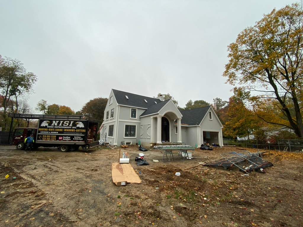 Roof, skylights, soffits and gutters. by Nisi Home Improvement