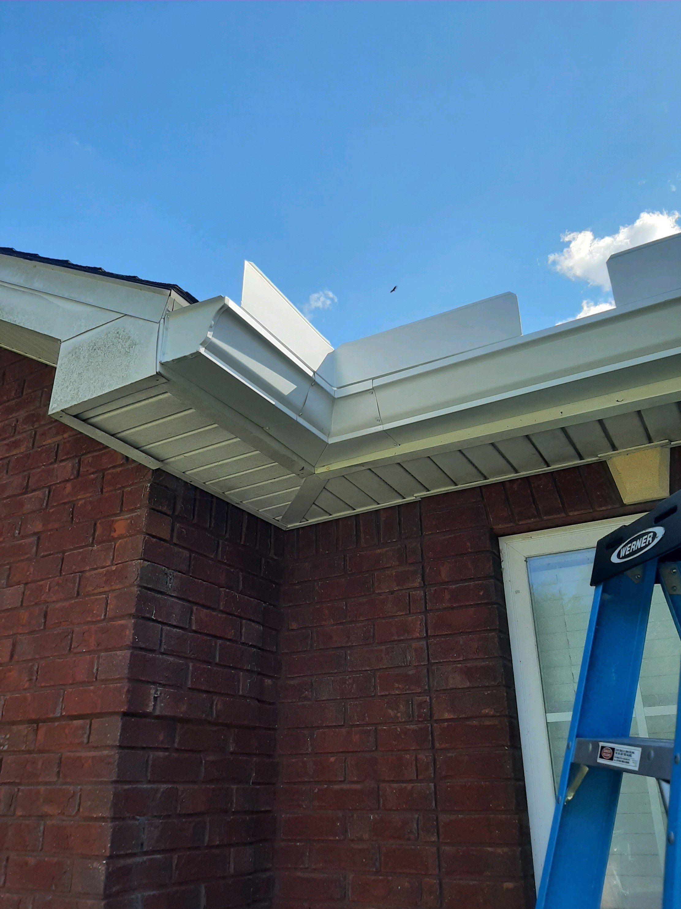 Gutter Installation using White K-Style Seamless Gutters by Gutter Professors