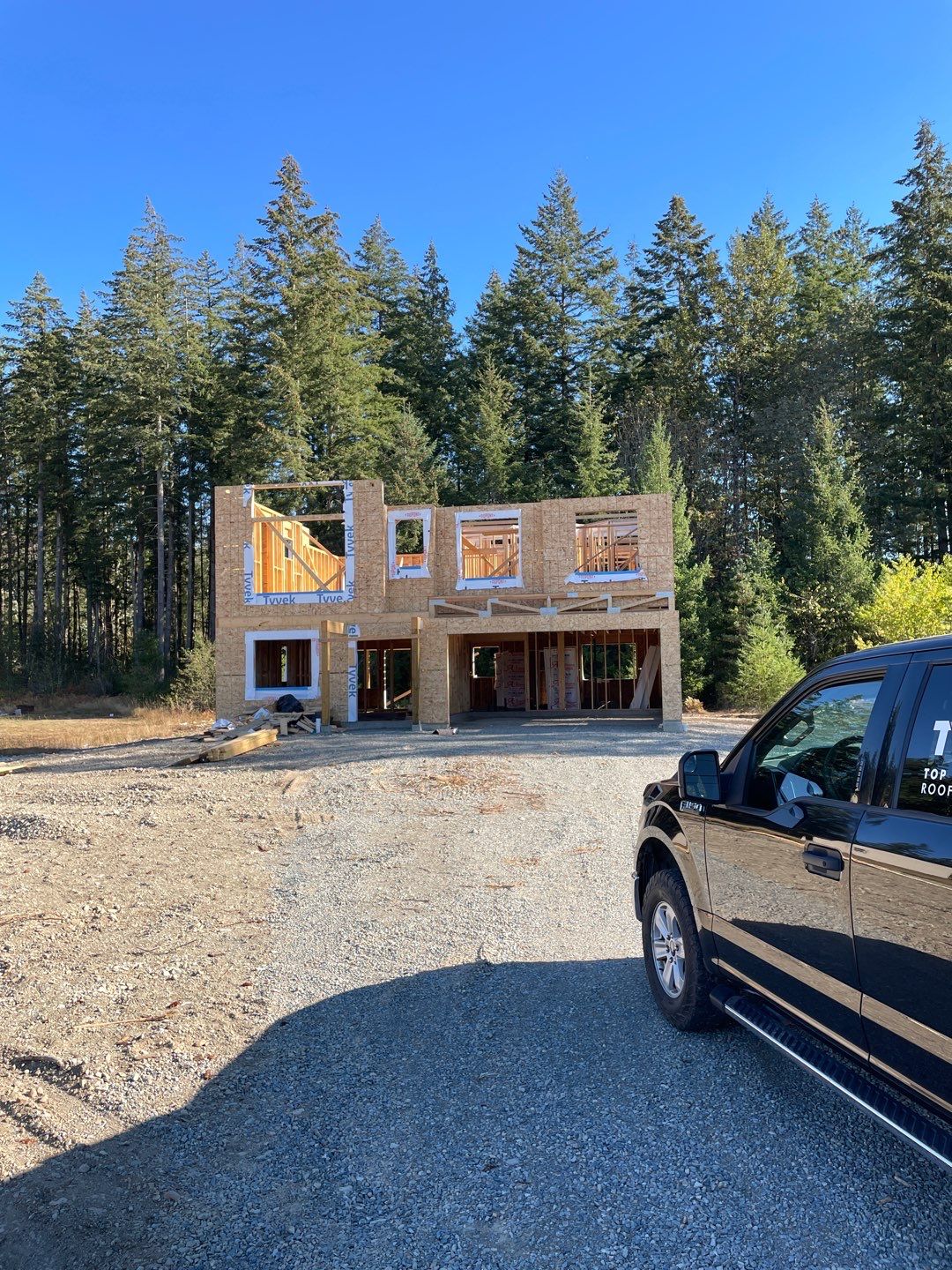 Residential Roofing Installation using OC Oakridge shingles by Top Notch Roofing Inc