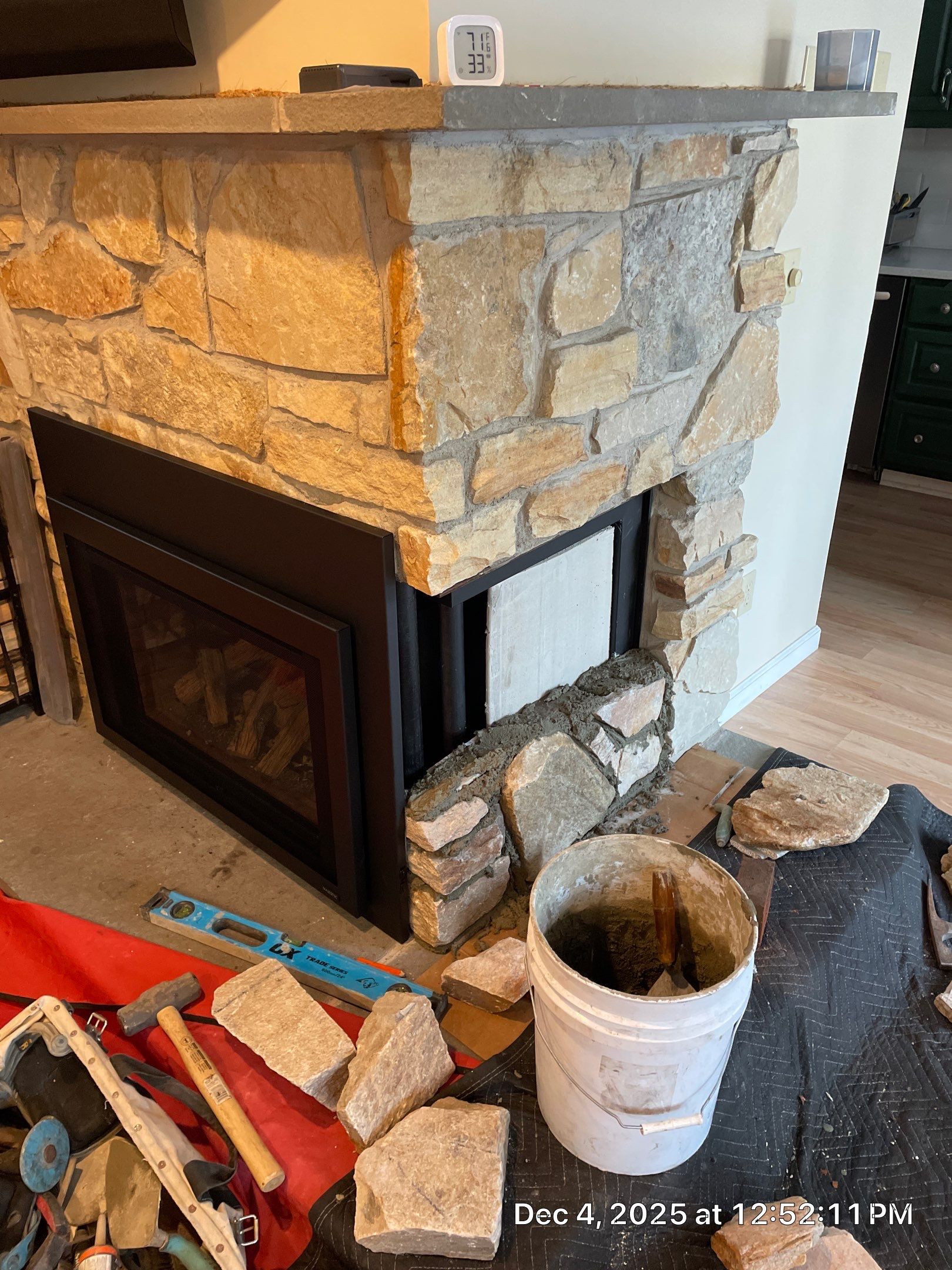 Gas Insert in corner fireplace by Neighborhood Chimney Services 
