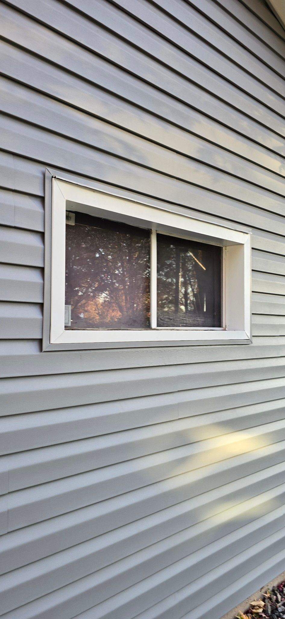 Siding Replacement with Vinyl Siding in Granite Gray by Gellings Roofing and Siding LLC