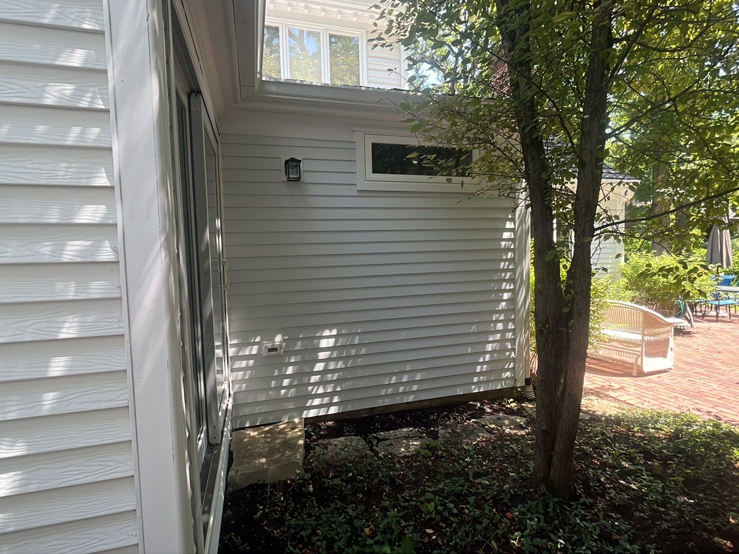 Housewashing  using Algaecide, soft wash soap by Northern Power Washing LLC.