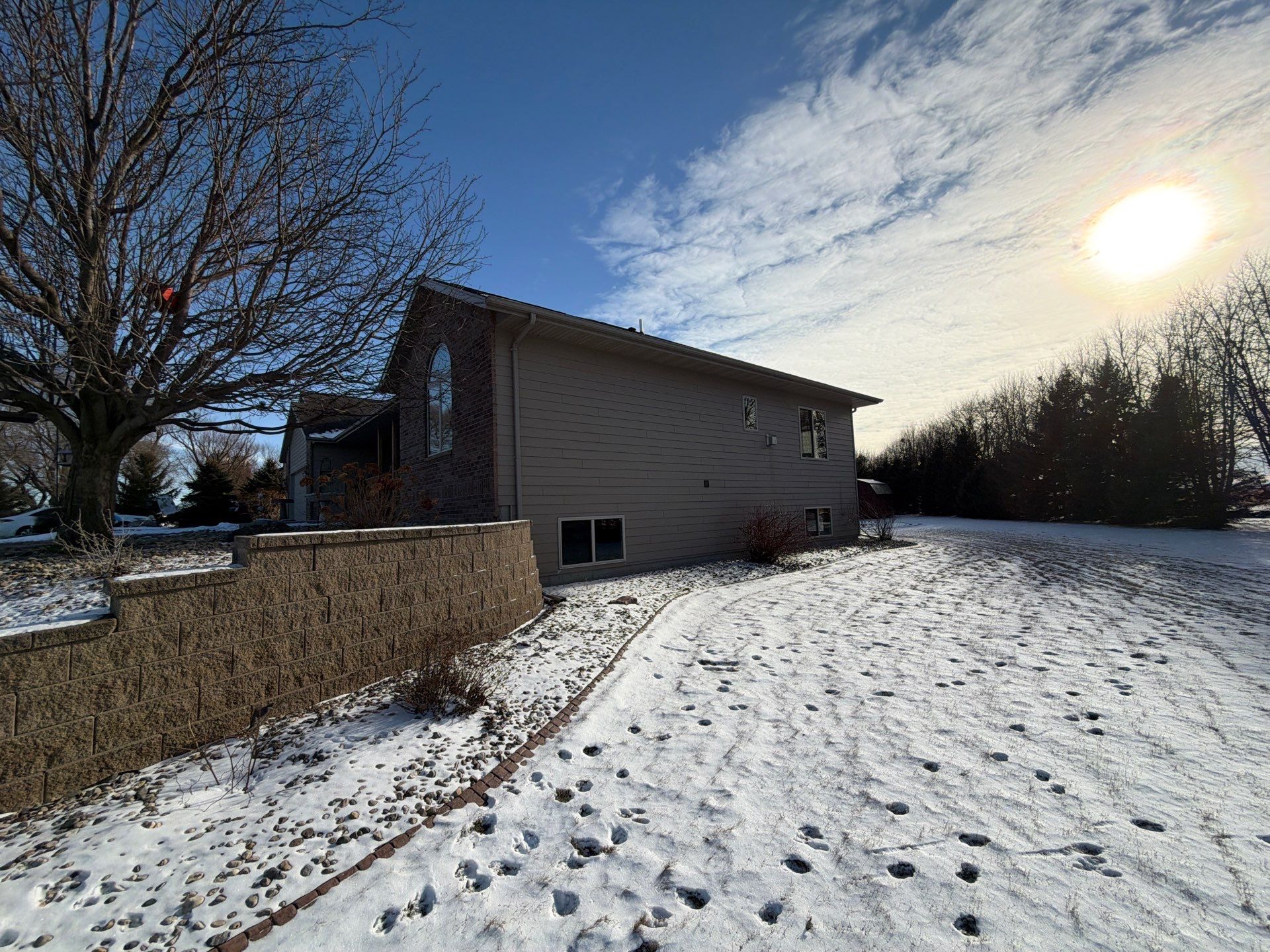 Full Exterior Siding Transformation and Trim Update in Garretson by Select Painting, Coatings & Garage Cabinets