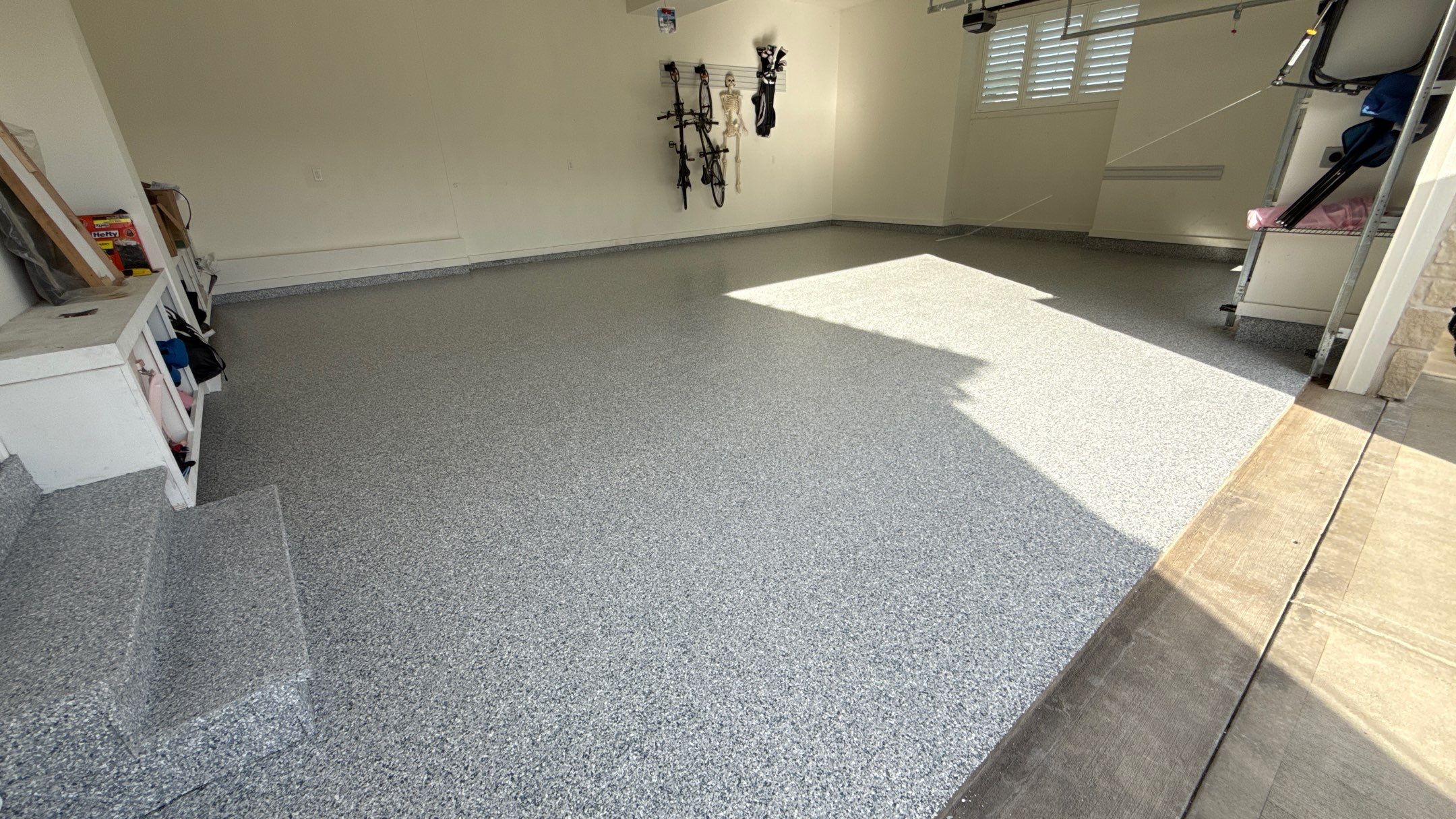 Nick's New Floor & Storage Looks Beautiful by Banner Garage