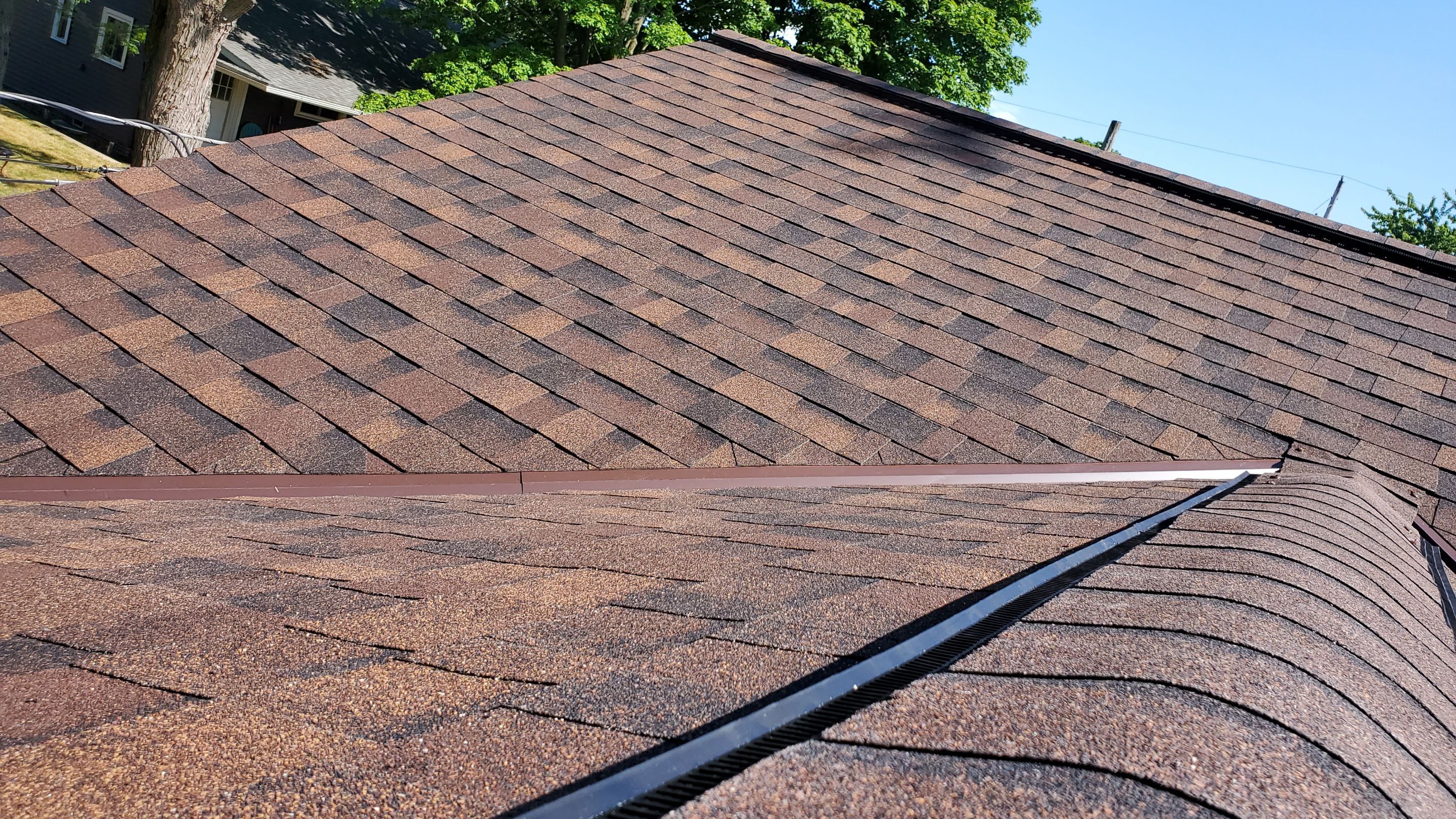 Residential Roofing Installation using Ownens Corning Duration Brownwood by Absolute Roofing and Construction