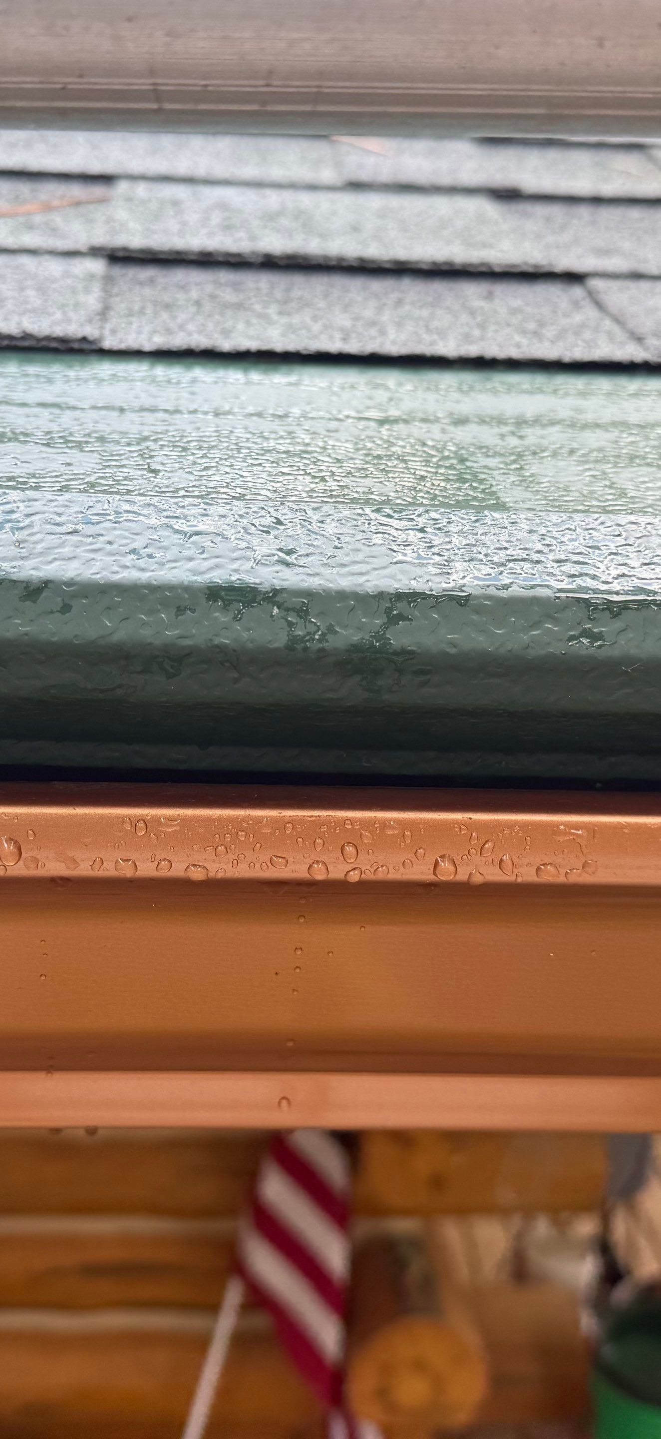Copper Gutter and Gutter Helmet Installation on Williamsburg Log Cabin by Rainbow Seamless Systems