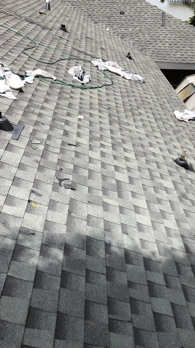 Residential Roofing Installation using Roof Replacement by American Roofing & Construction LLC