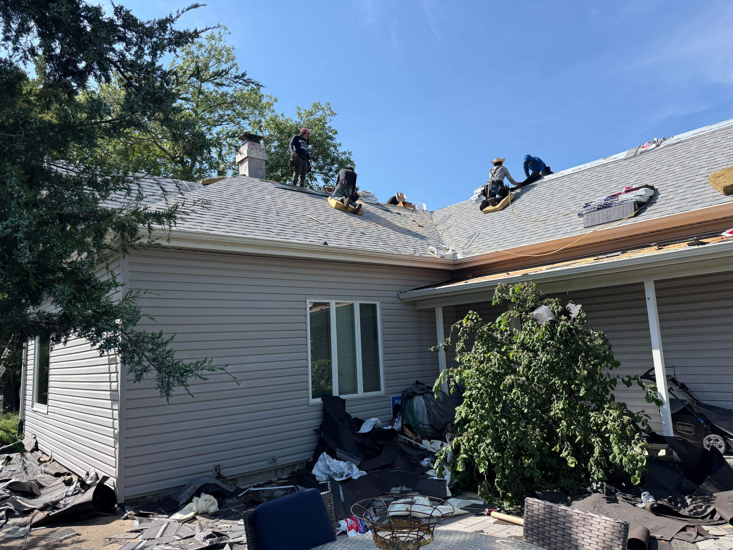 Asphalt Shingle and EPDM Membrane Roof Installation in Mineola by Star Home