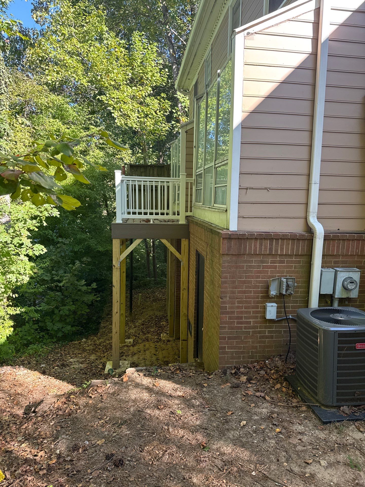 Atlanta, GA Deck Rebuild using Deckorators Venture Series Decking and Trex Railing by Nelson Exteriors 