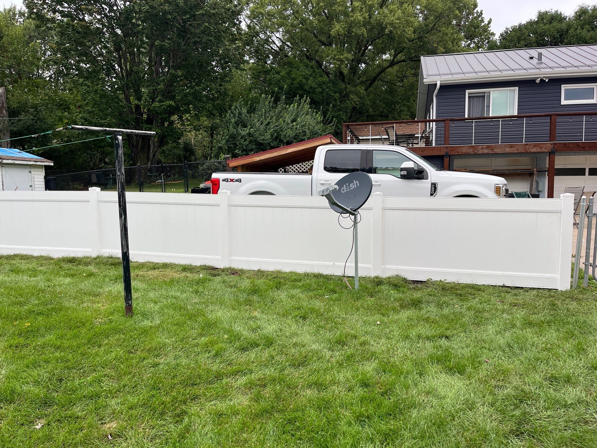 New White Vinyl Privacy Fence and Gate Installation in Waterloo by Perfect Picket Fence and Stain