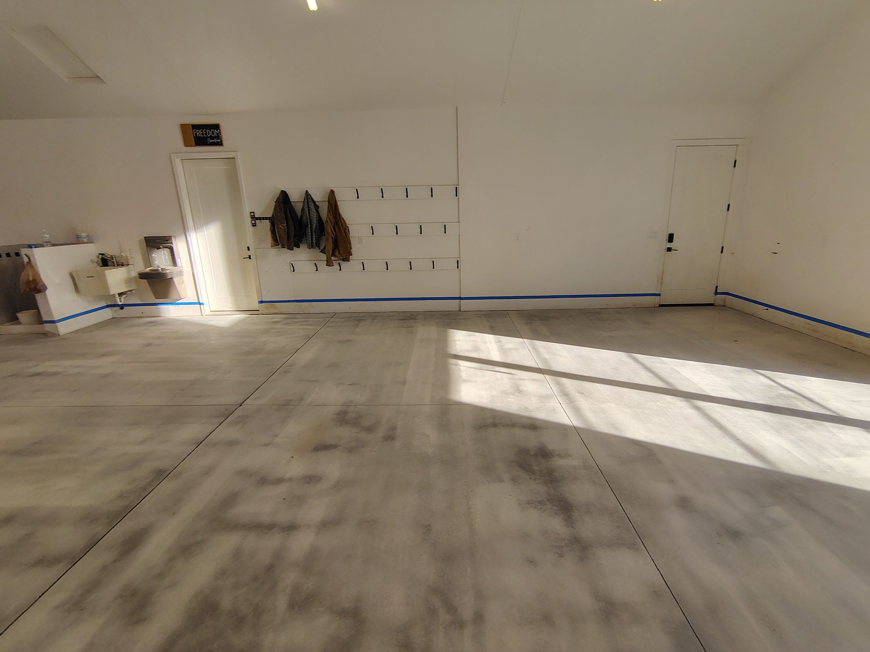 Epoxy Flake Garage Floor and Stair Coating in Sioux Falls by Select Painting, Coatings & Garage Cabinets