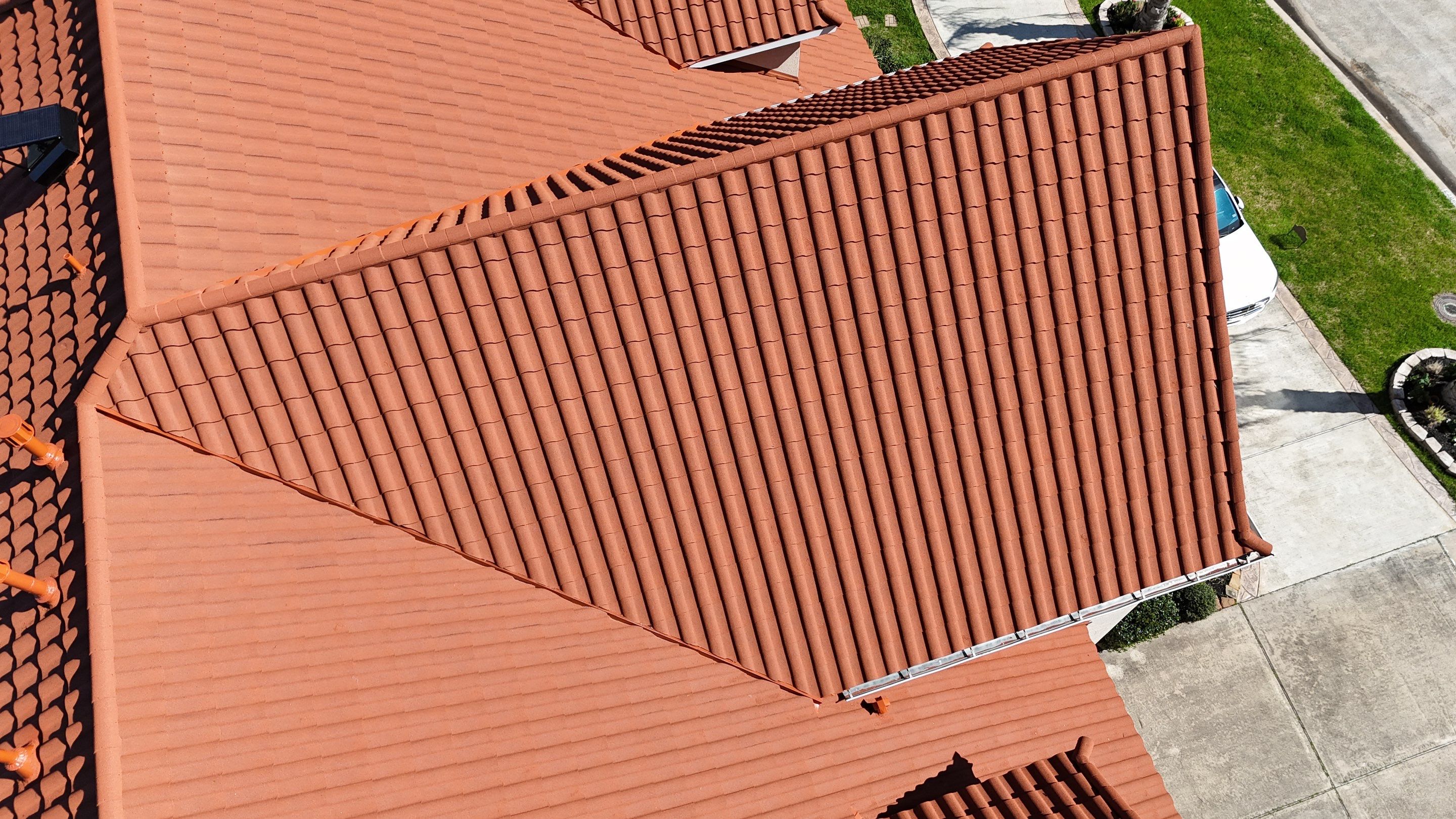 Stunning transformation using DECRA Villa Tile!  by Core Four Roofing