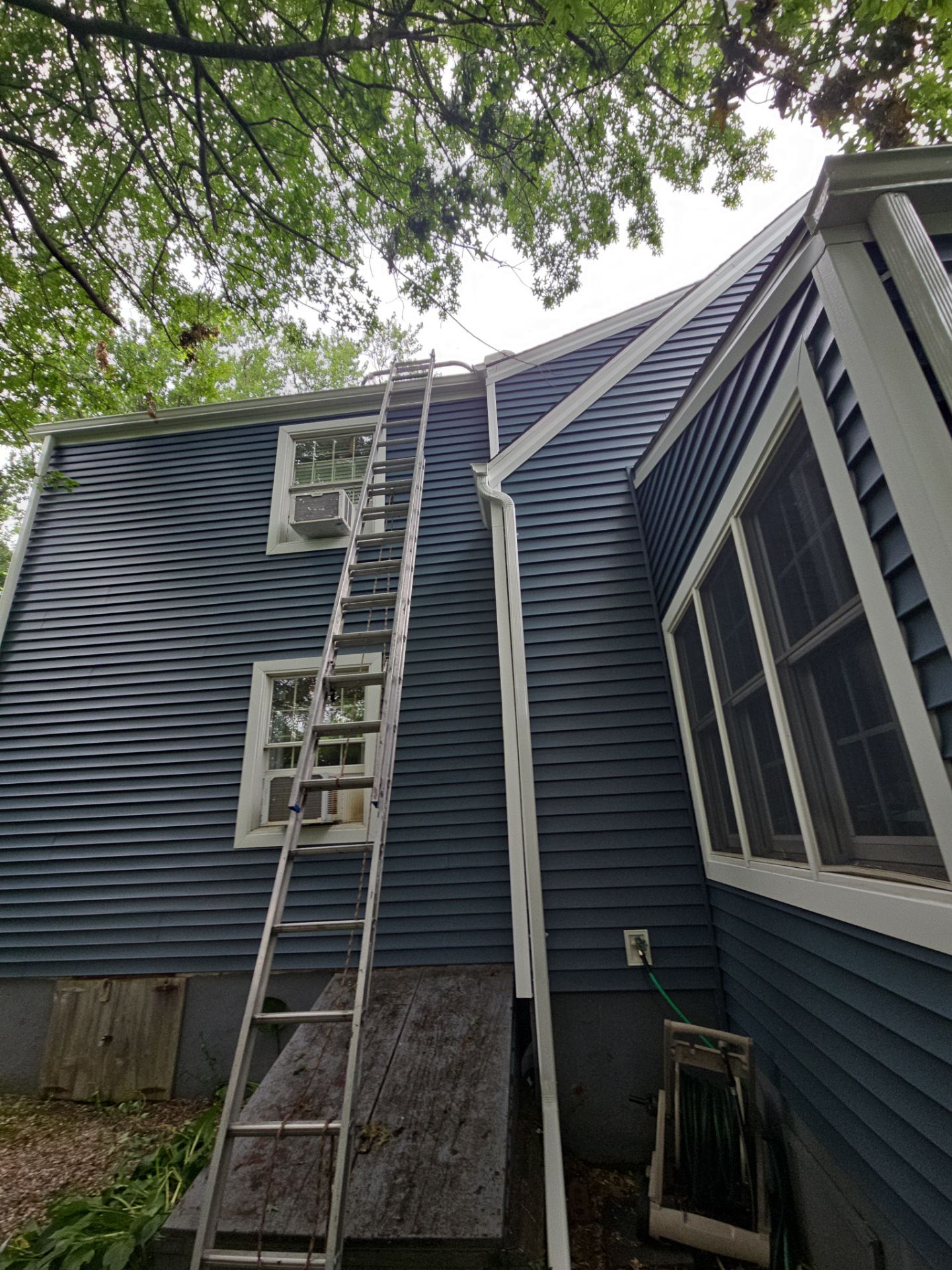 Complete Exterior Estate gray with Pacific Blue Siding by A Plus Exterior