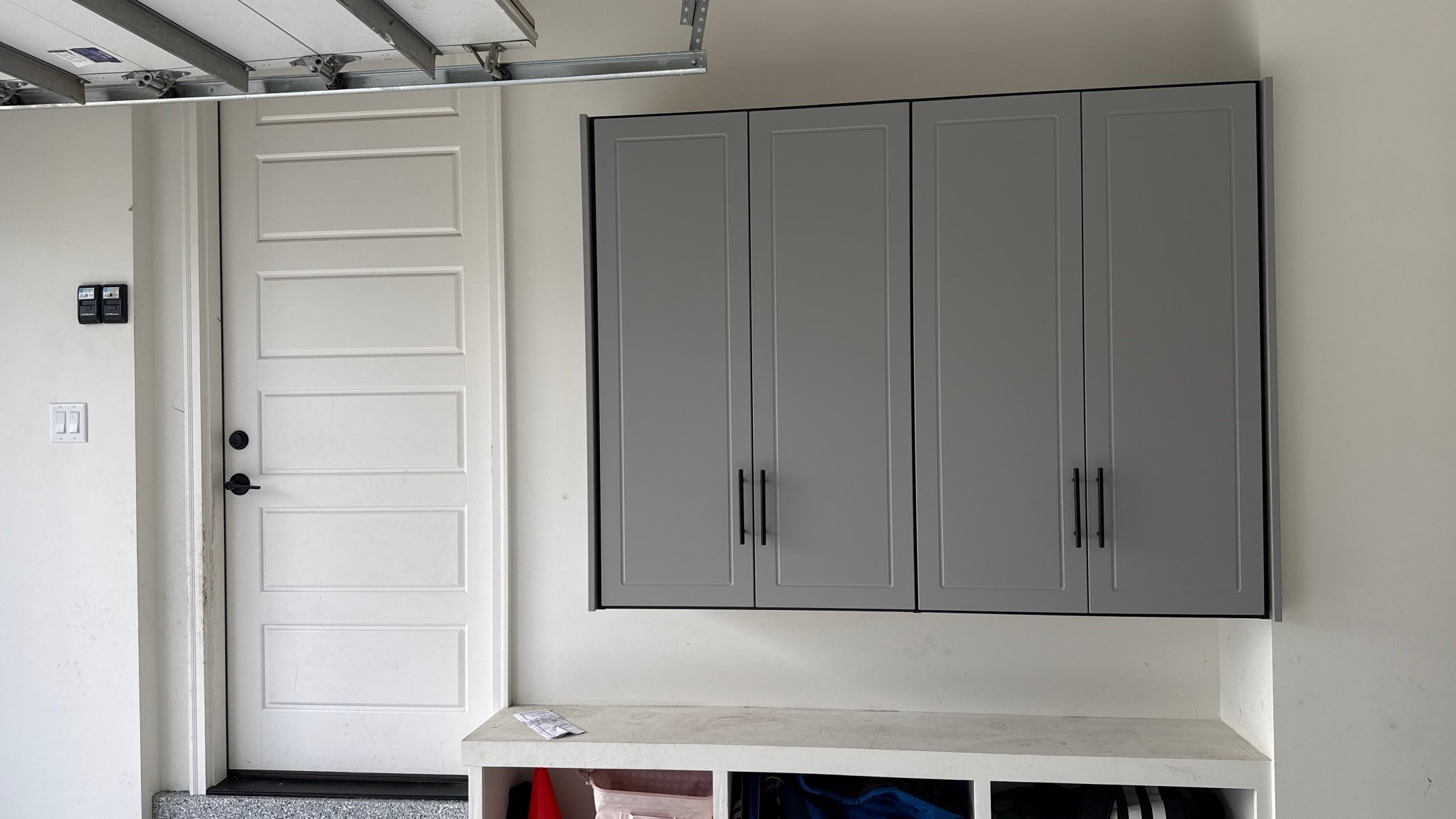 Nick's New Floor & Storage Looks Beautiful by Banner Garage