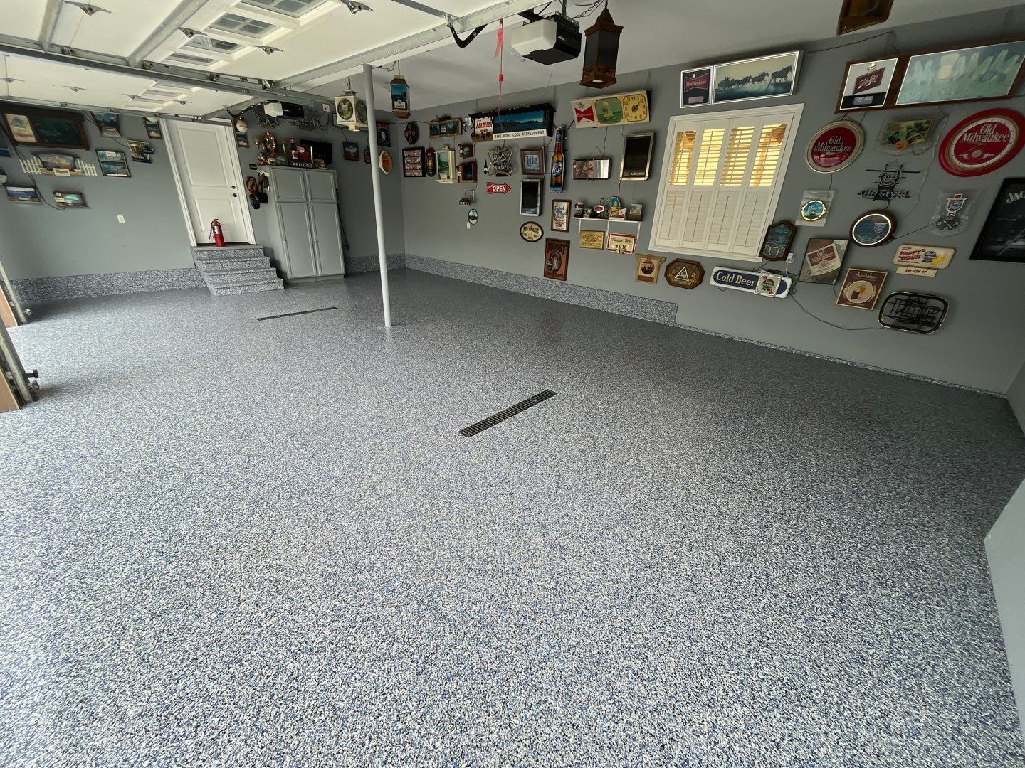 Garage using Orbit by Select Painting, Coatings & Garage Cabinets