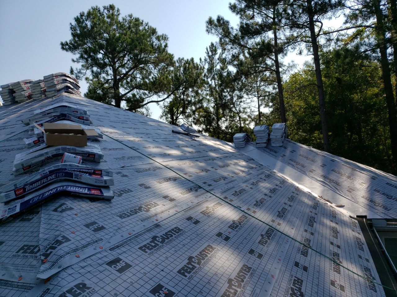 Residential Roofing Installation using Roof Replacement by American Roofing & Construction LLC