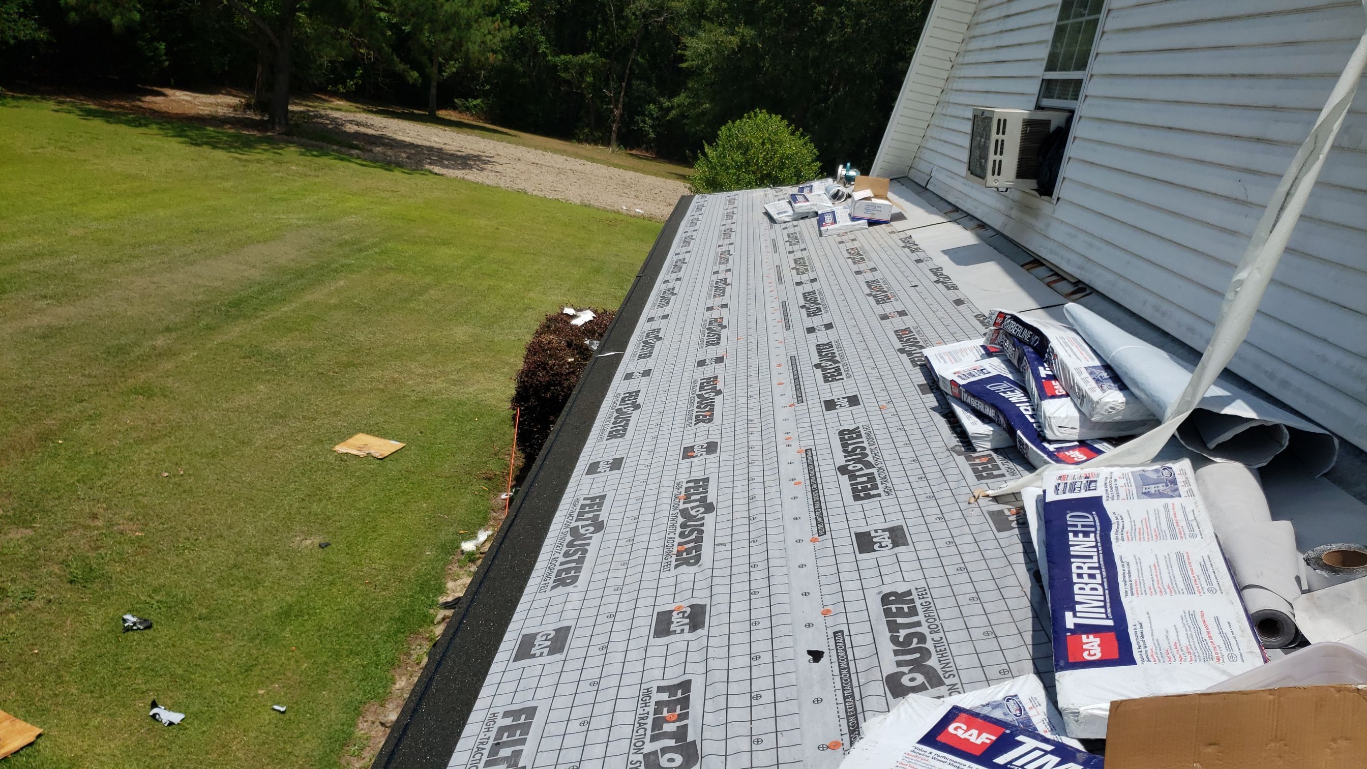 Residential Roofing Installation using Roof Replacement by American Roofing & Construction LLC