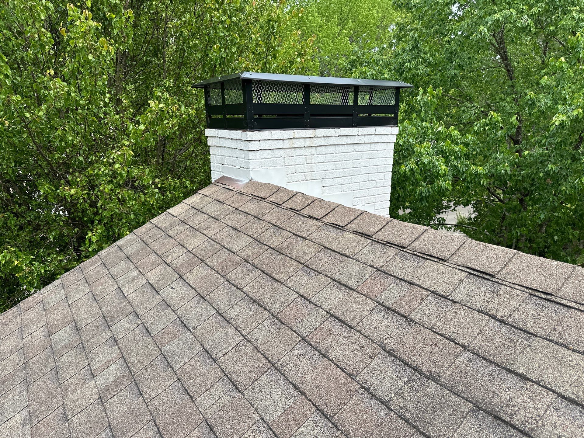 Residential Roofing Repair using Custom Fabricated Chimney Cap by Paragon Roofing