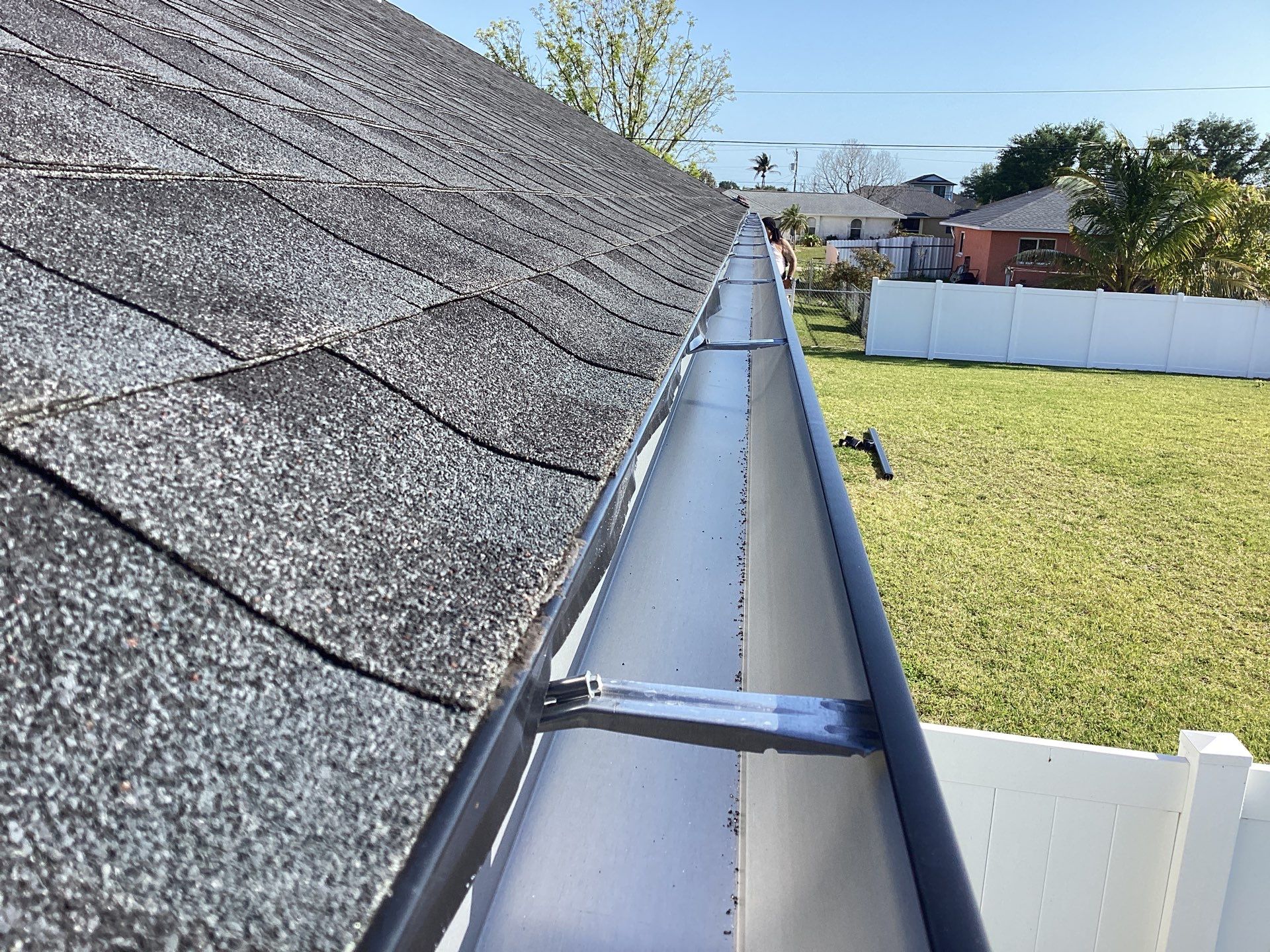 Black Seamless Gutters using 6 Inch Seamless Gutters in Cape Coral FL by Gutter Professors