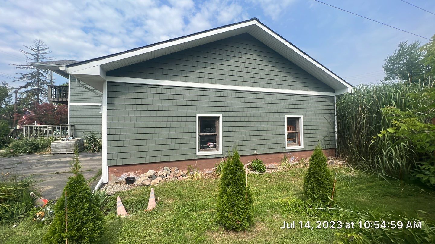 Siding Installation using CertainTeed Cedar Impressions by Bloomfield Construction & Restoration