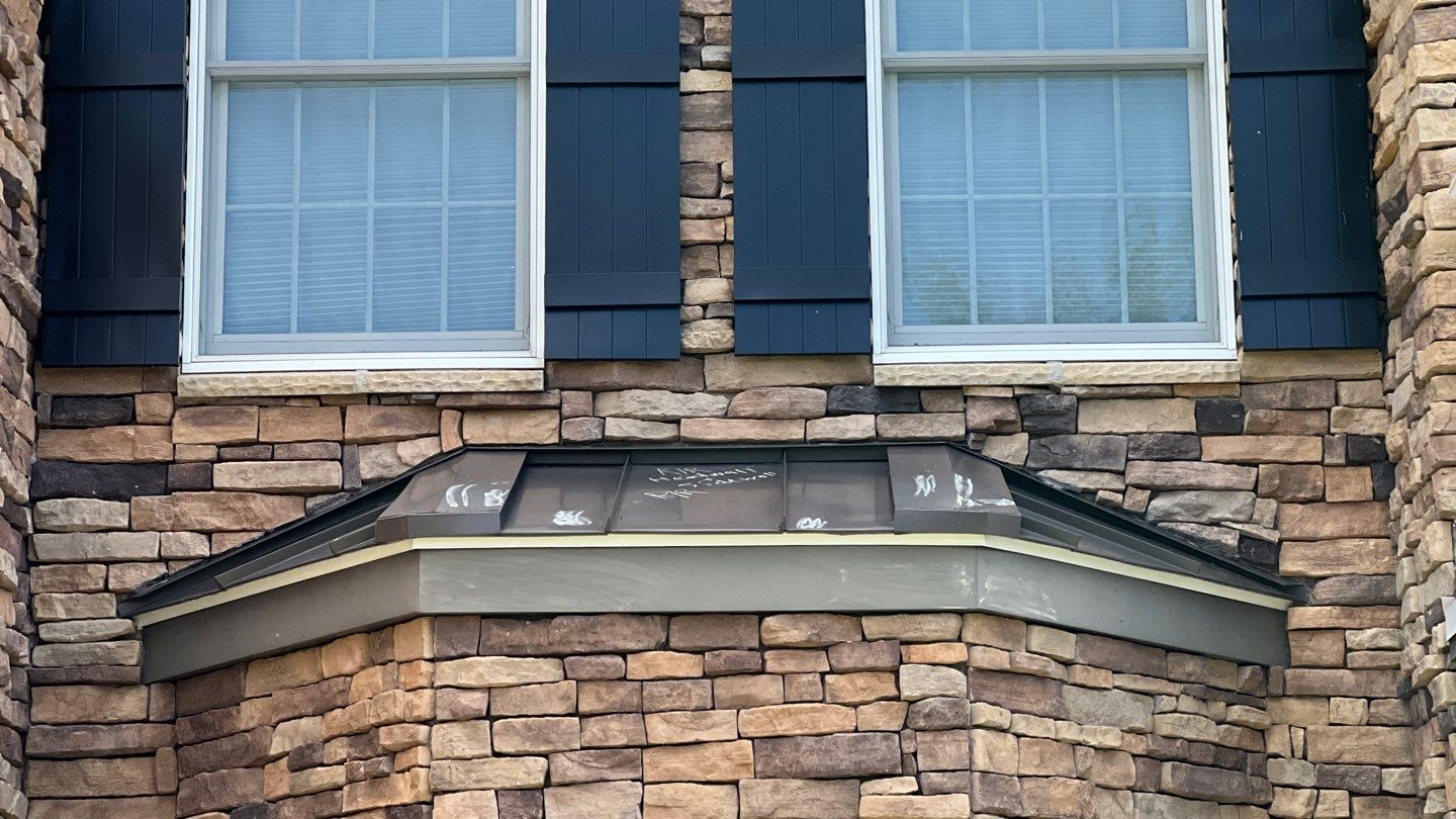 Roof Damage using Certainteed Lifetime Roofing System- Moire Black Landmark Pro shingkes with shadow ridge caps. by BulletpROOF Exteriors