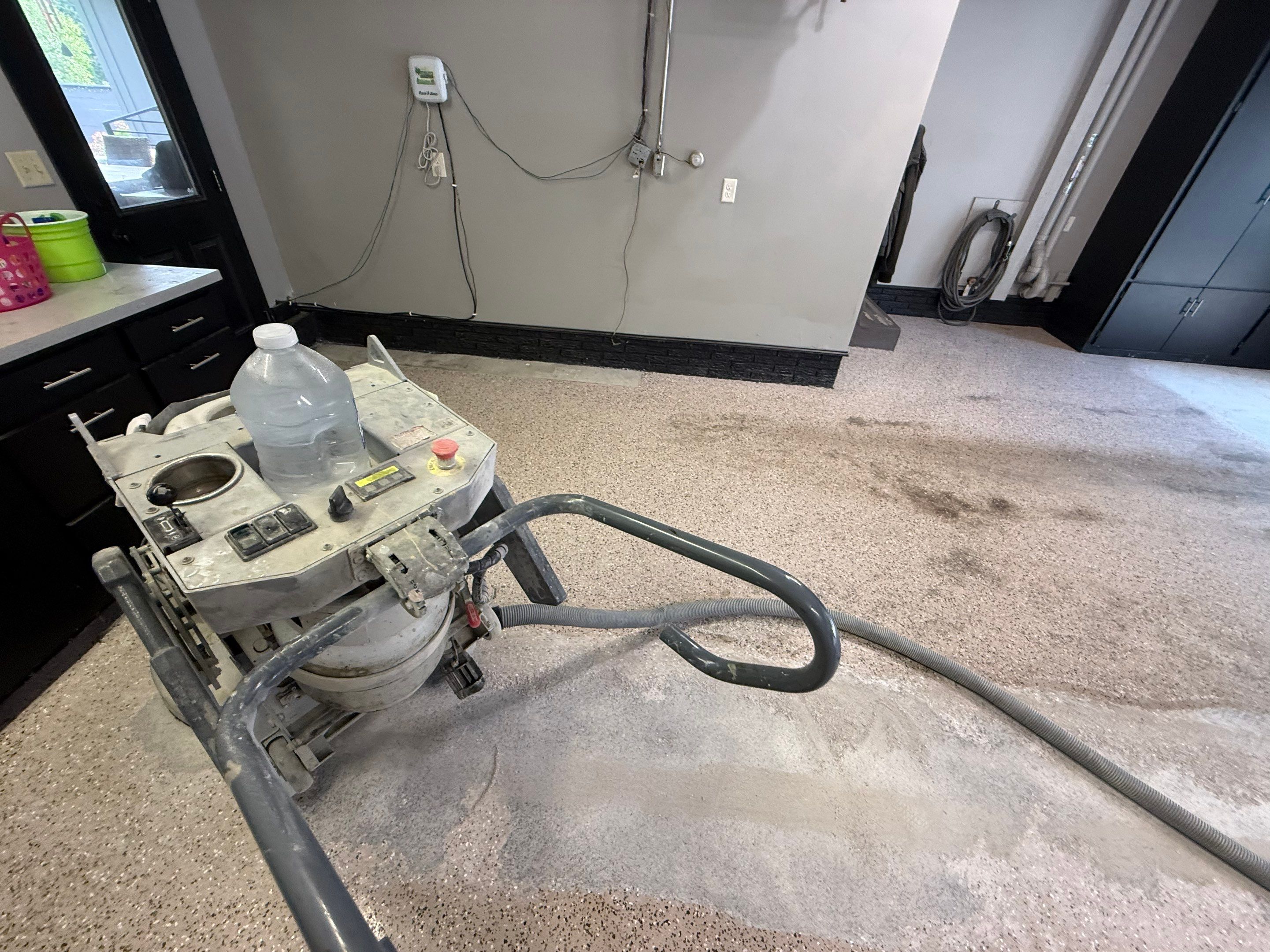 Garage Floor and Textured Pool Deck Coating in Sioux Falls by Select Painting, Coatings & Garage Cabinets