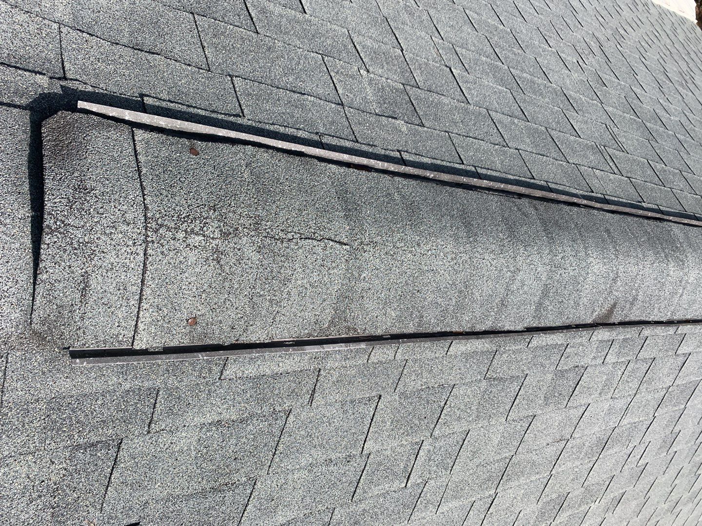 Re Roof by American Roofing NC